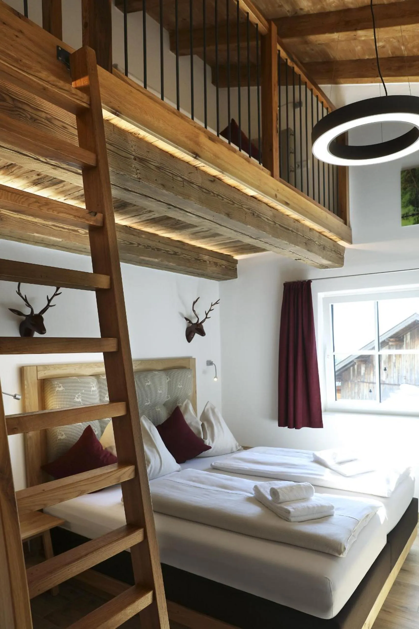 Bed in Tauernsuites Mitterwirt by ALPS RESORTS