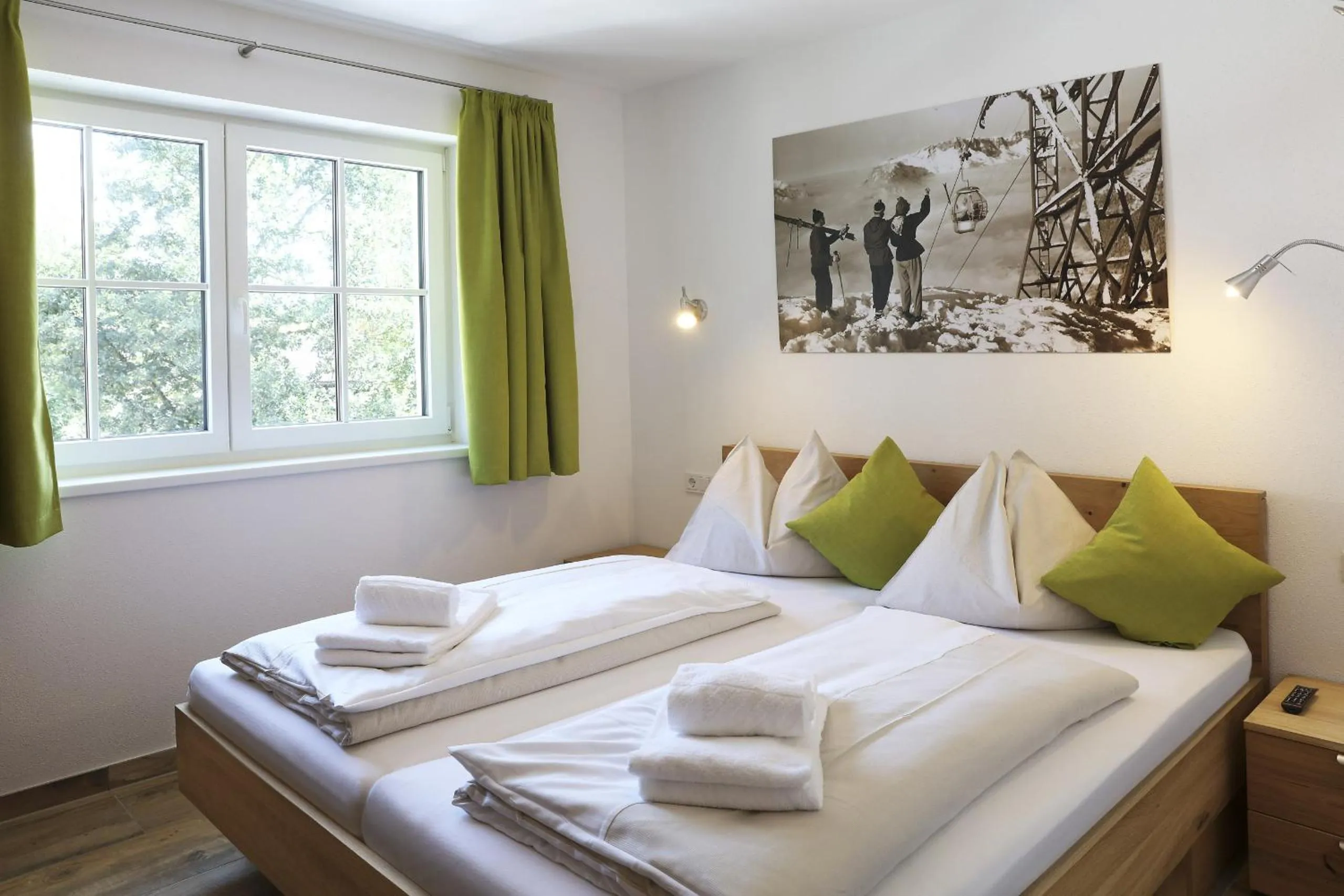 Bed in Tauernsuites Mitterwirt by ALPS RESORTS