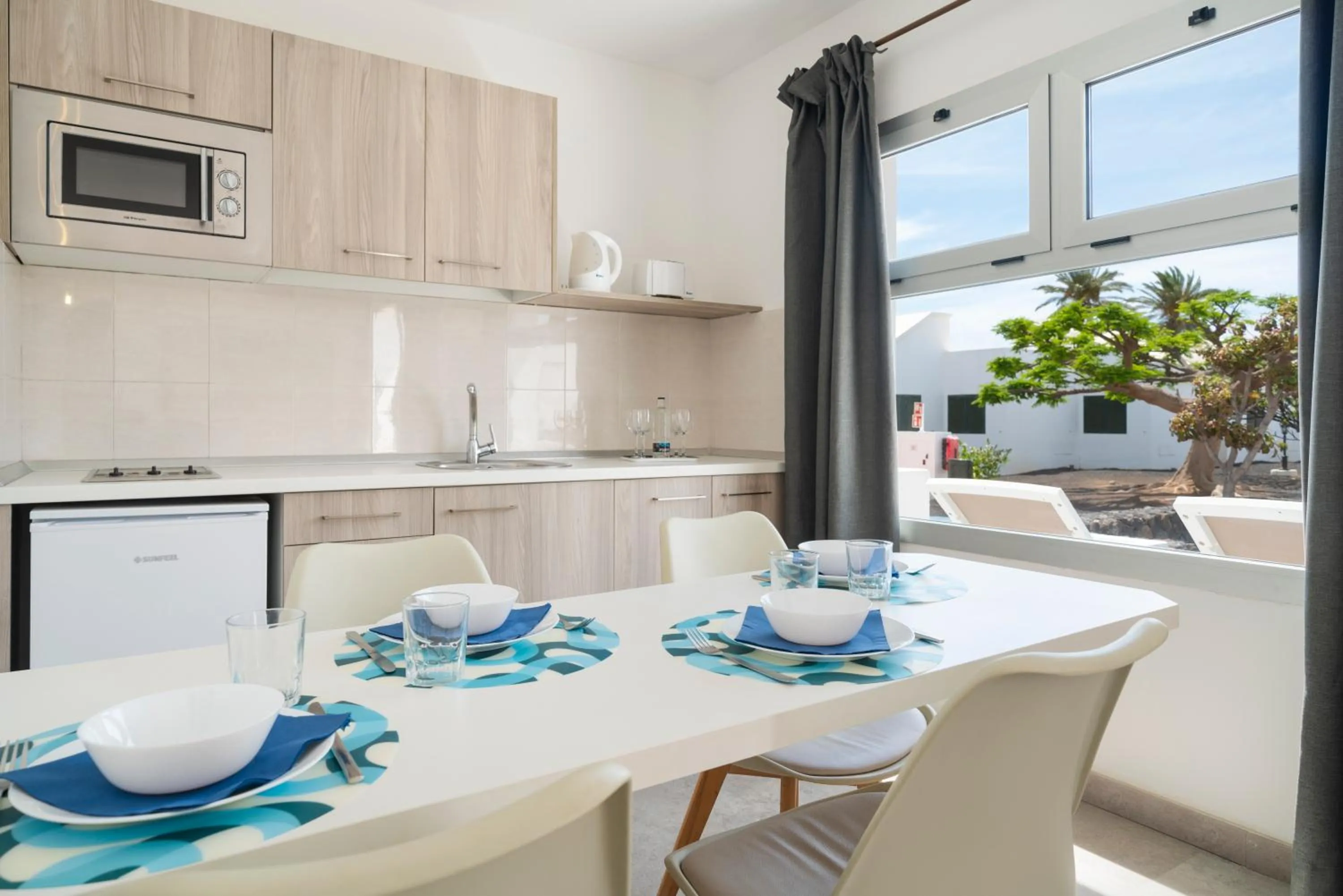 Kitchen or kitchenette in Apartamentos Santa Rosa