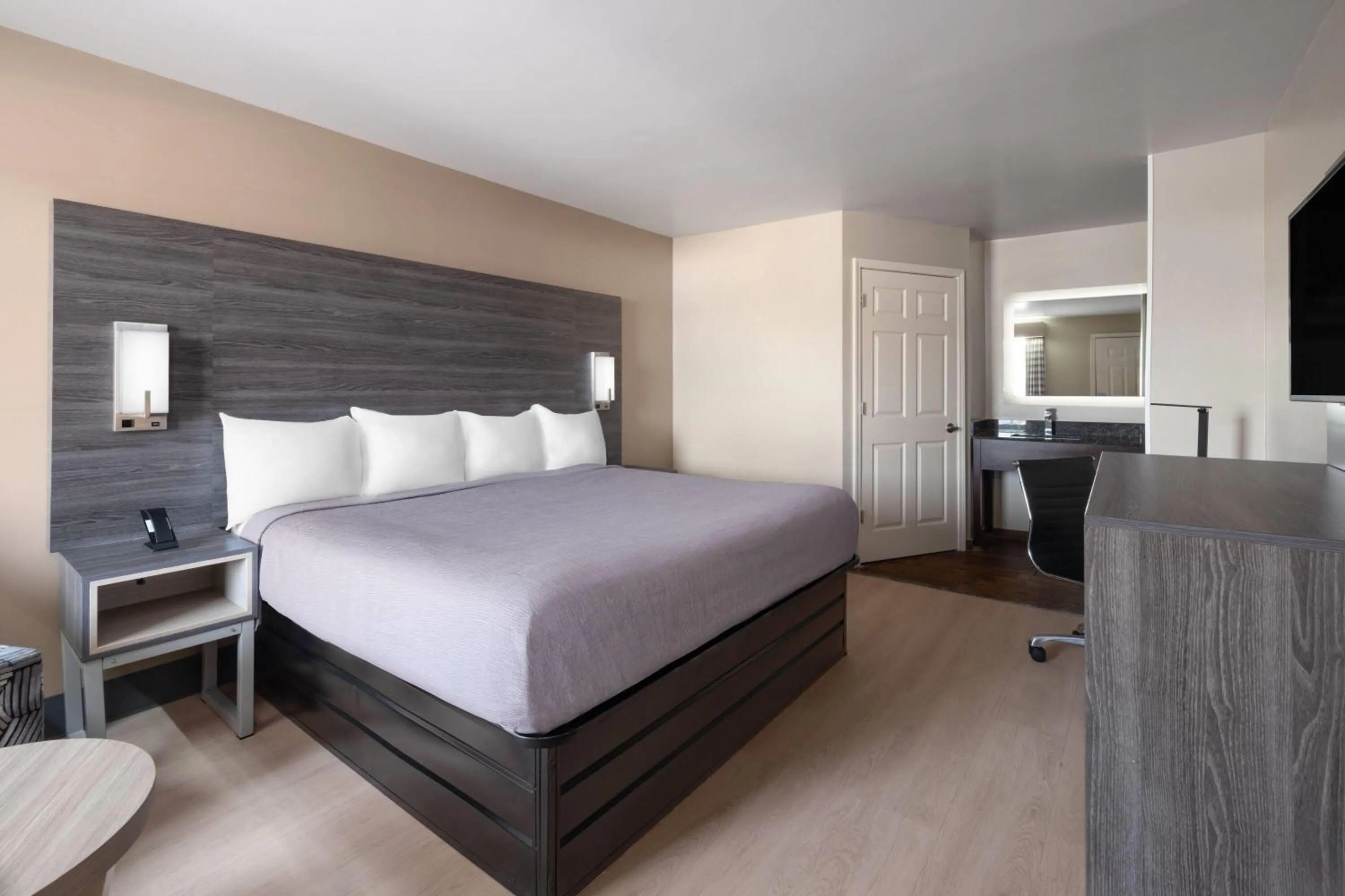 Photo of the whole room, Bed in Baymont by Wyndham Commerce GA Near Tanger Outlets Mall