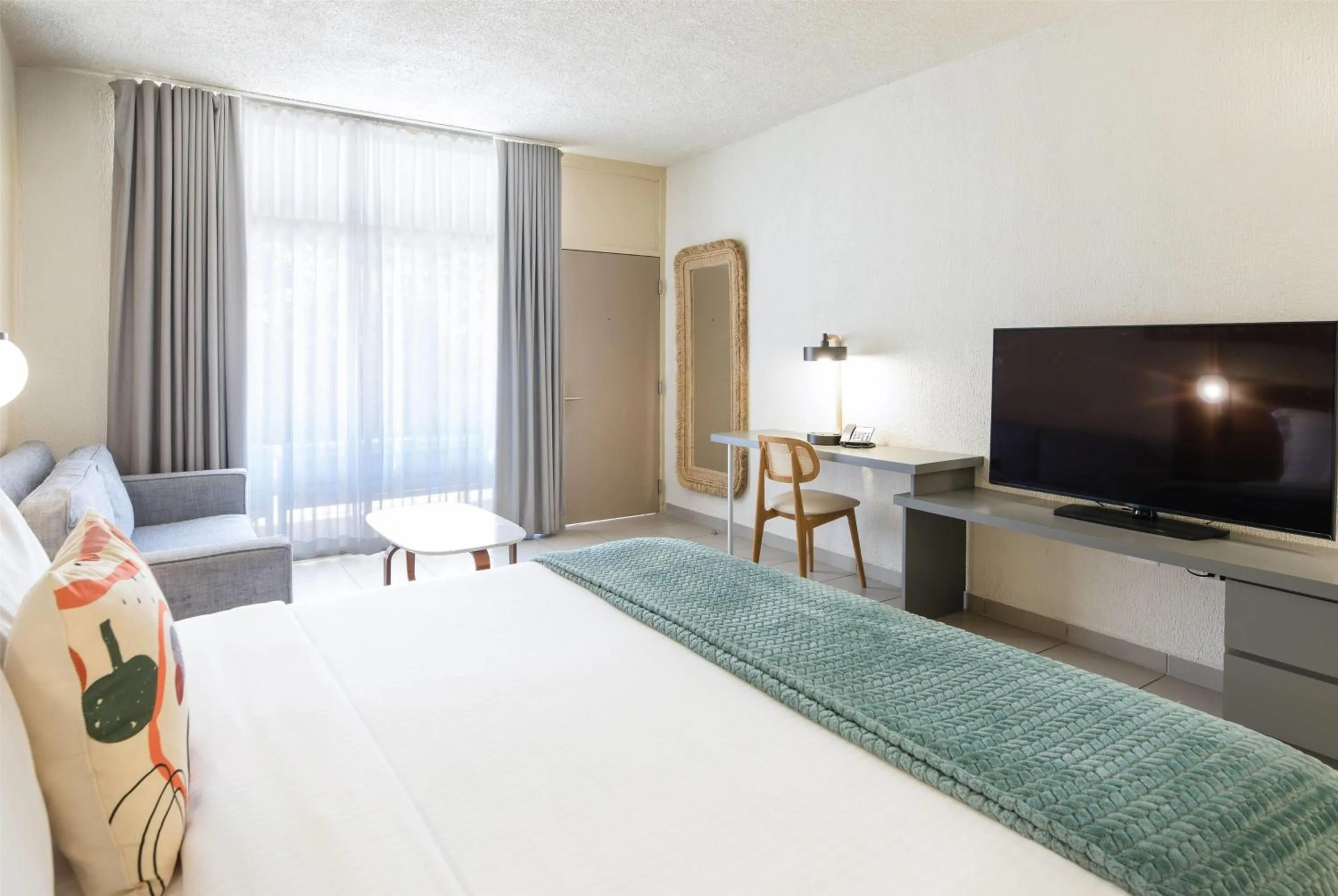 Photo of the whole room, Bed in Wyndham Palmas Beach and Golf Boutique Resort