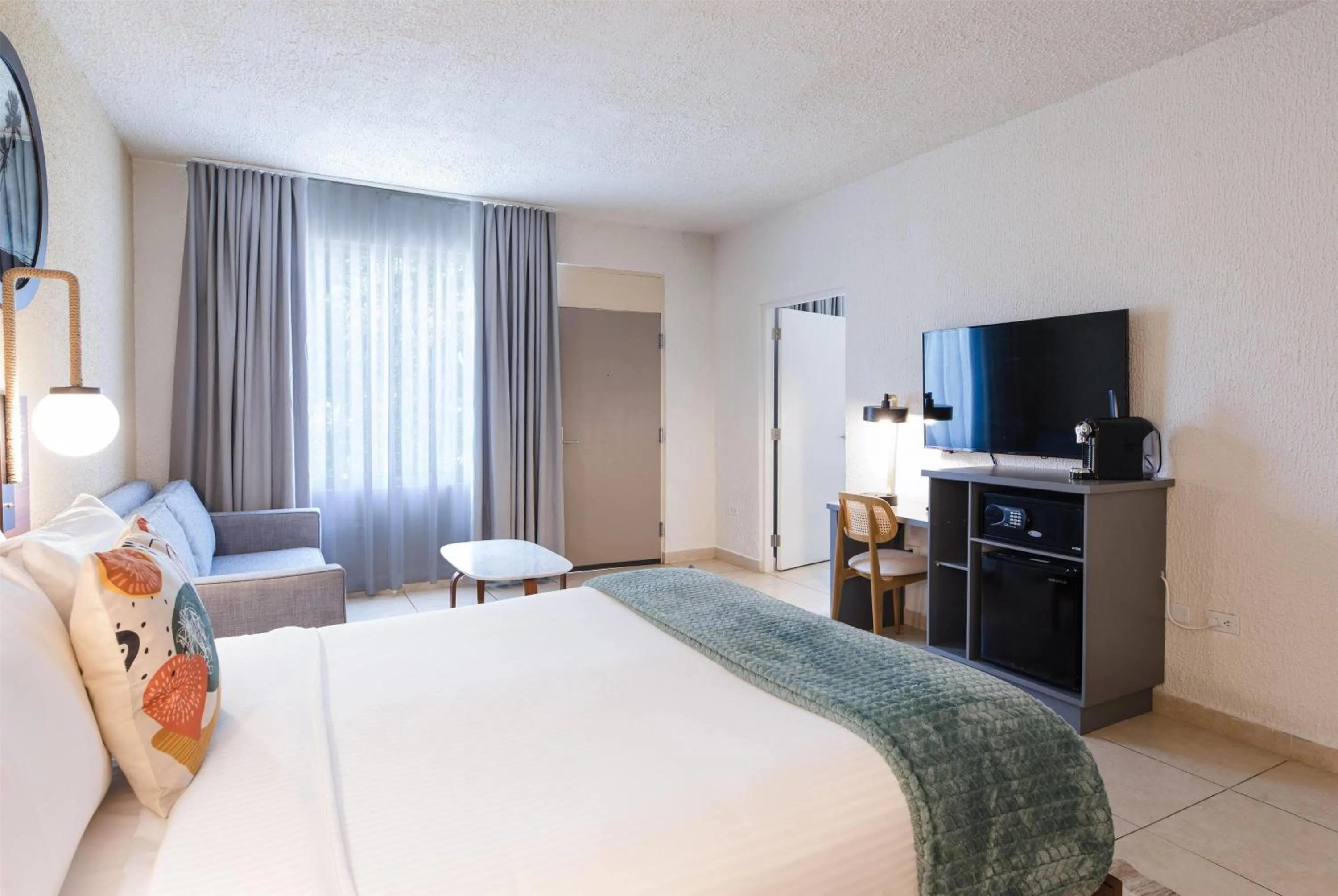 Photo of the whole room, Bed in Wyndham Palmas Beach and Golf Boutique Resort