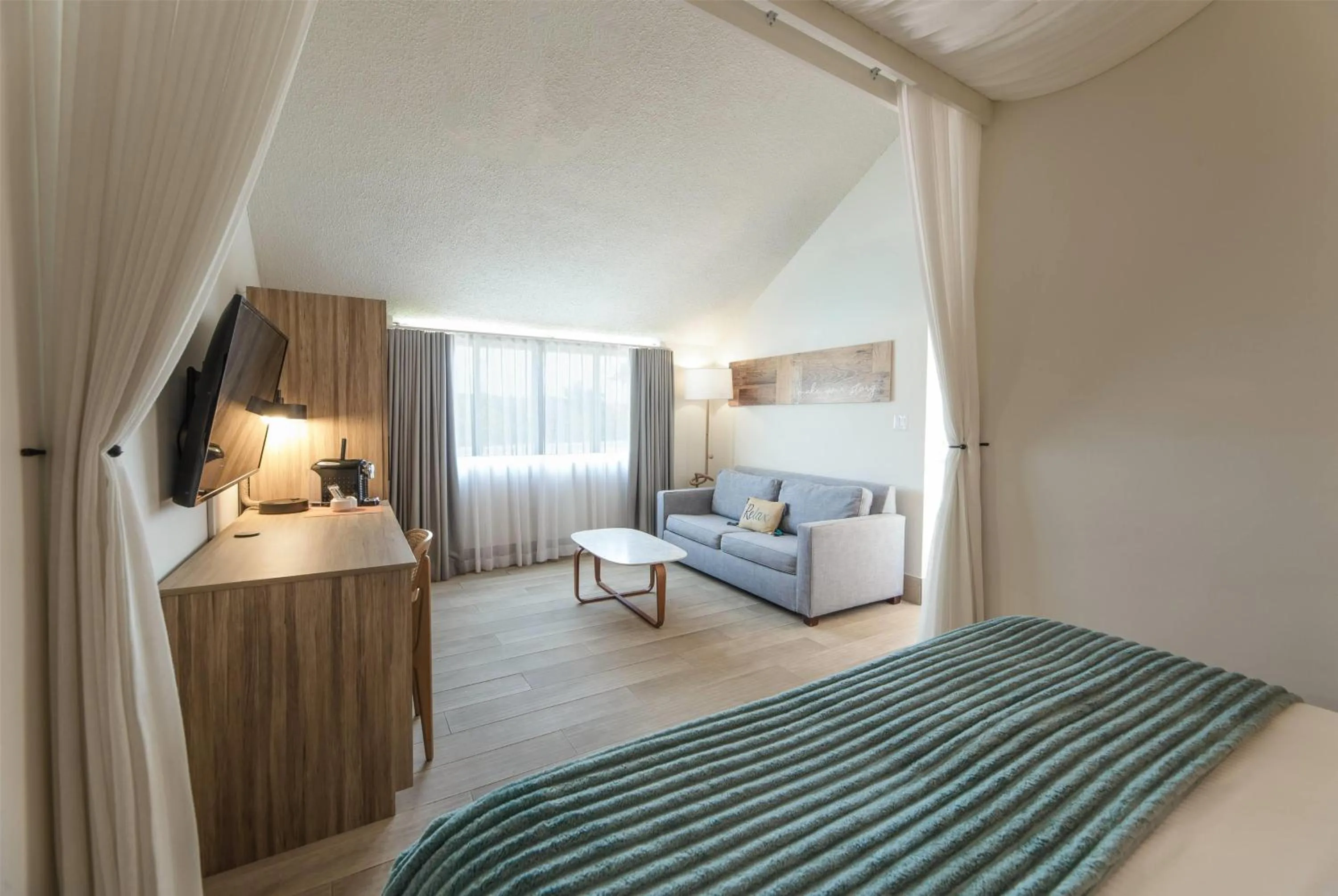 Photo of the whole room, Bed in Wyndham Palmas Beach and Golf Boutique Resort