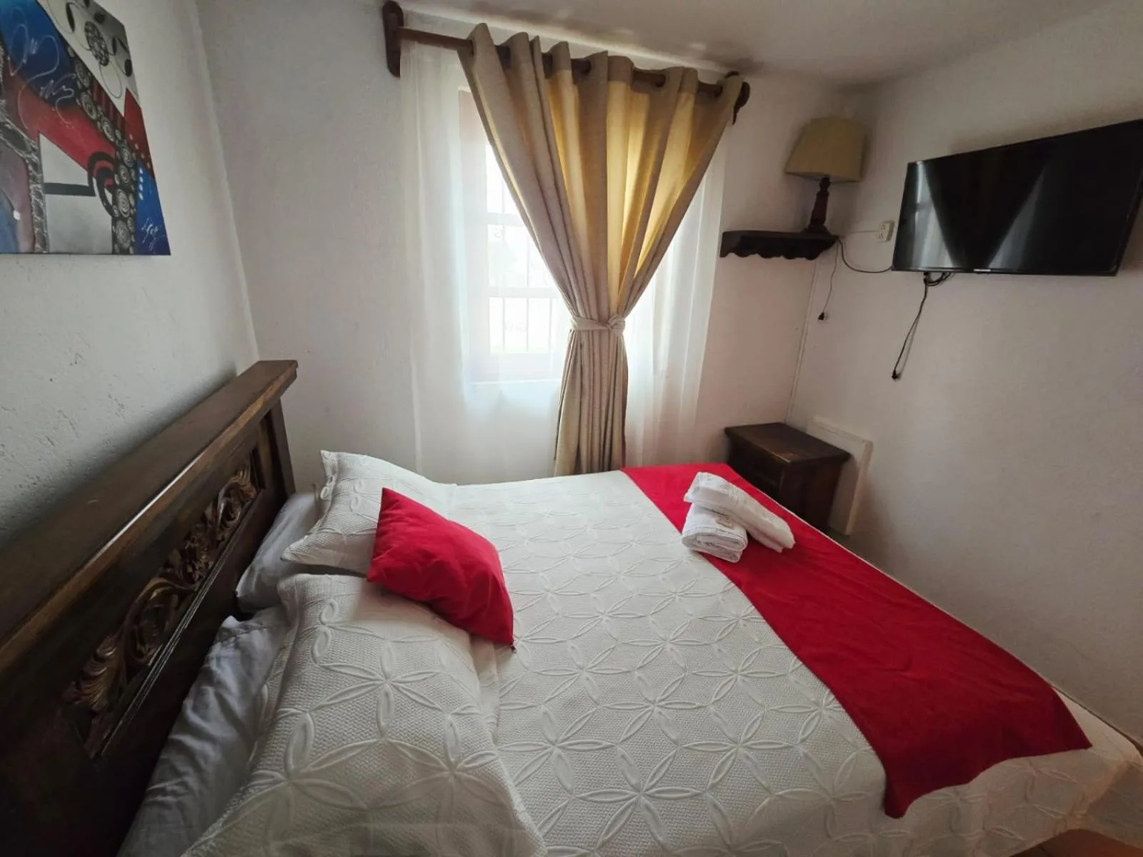 Photo of the whole room, Bed in Aparta Hotel El Refugio de María