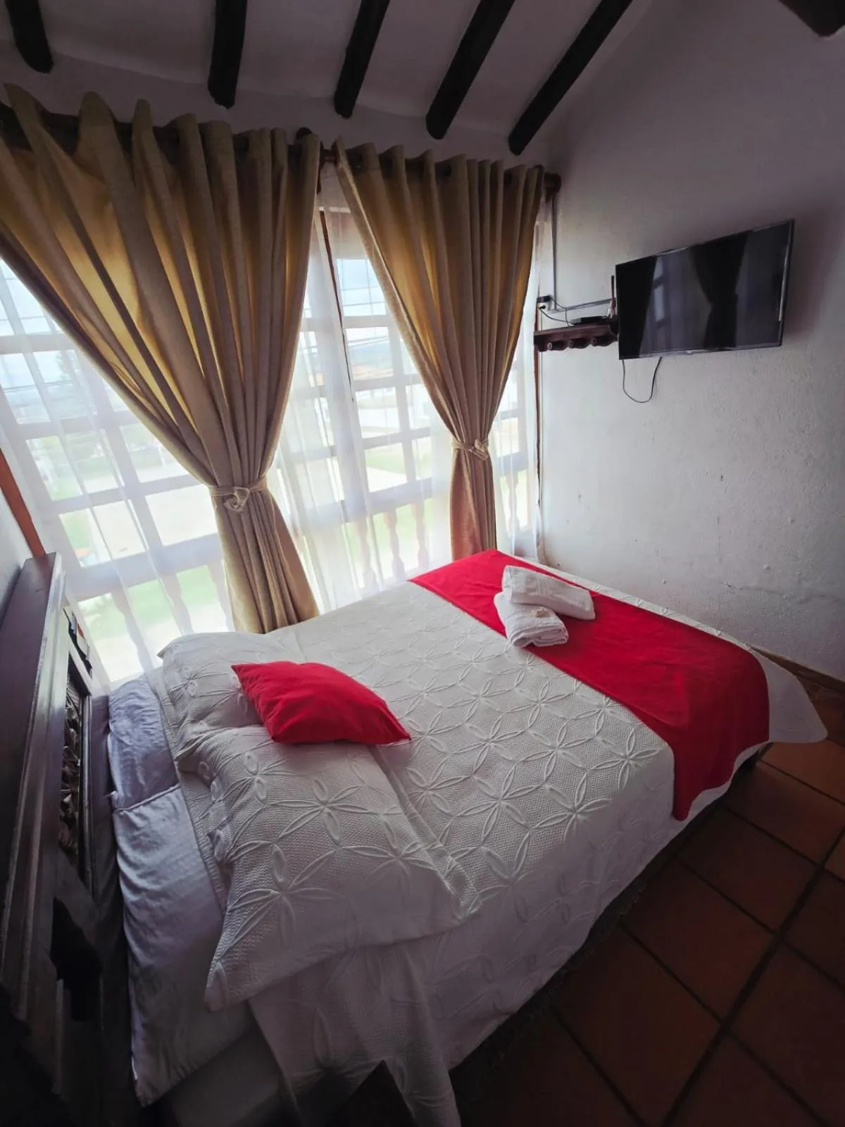 Photo of the whole room, Bed in Aparta Hotel El Refugio de María