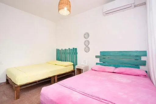 Bed in Casa Cálido Hotel