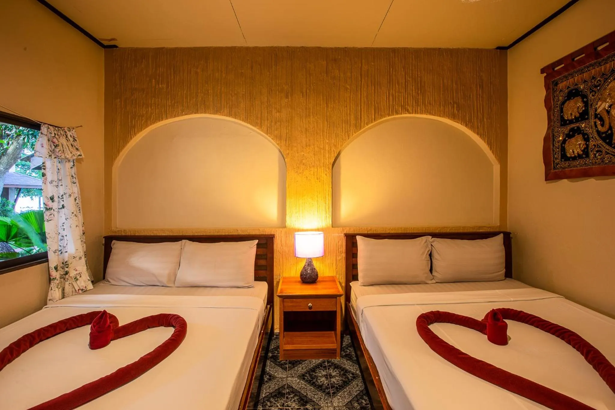 Bed in Nice Beach Resort Koh Pha-ngan