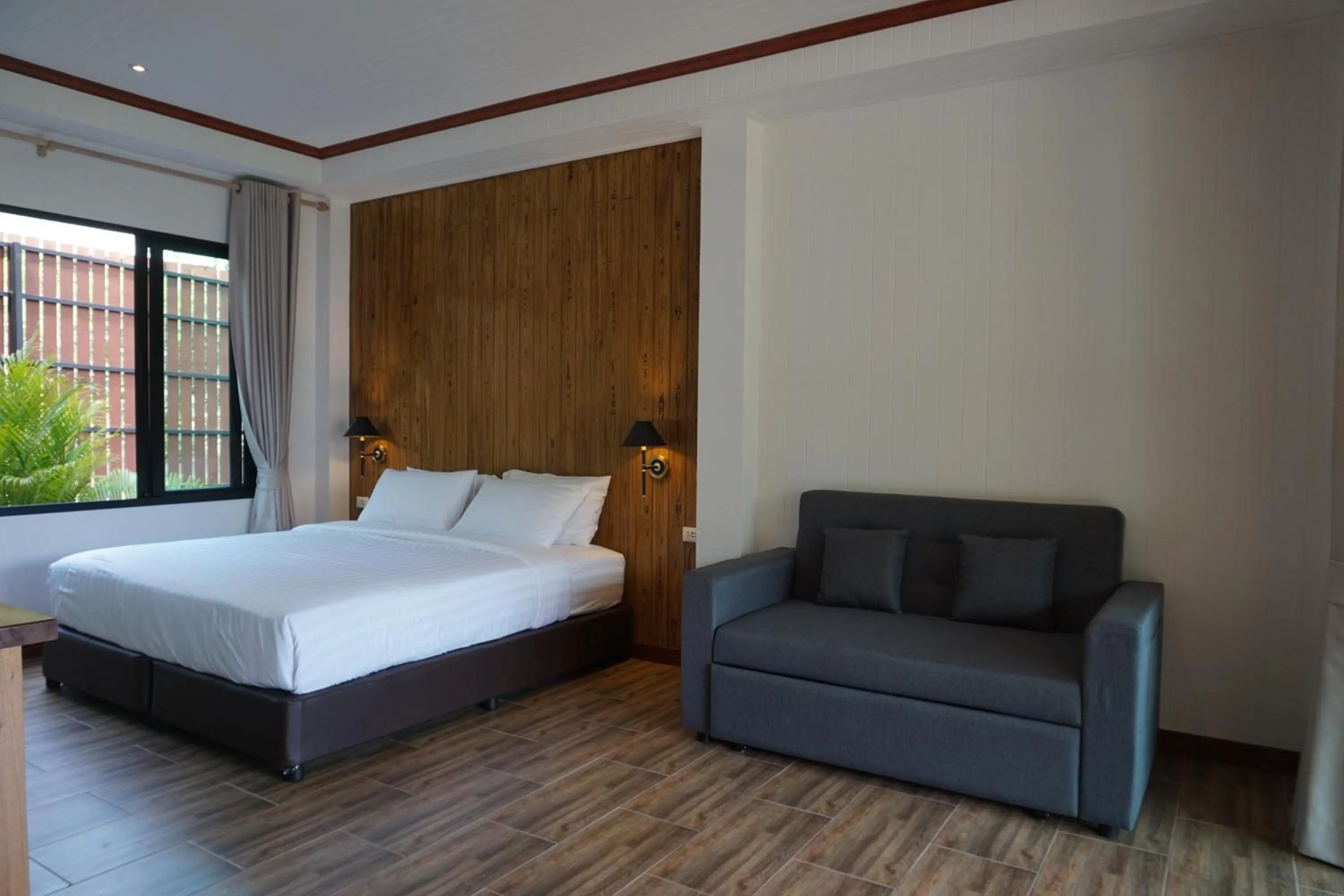 Photo of the whole room, Bed in Nice Beach Resort Koh Pha-ngan