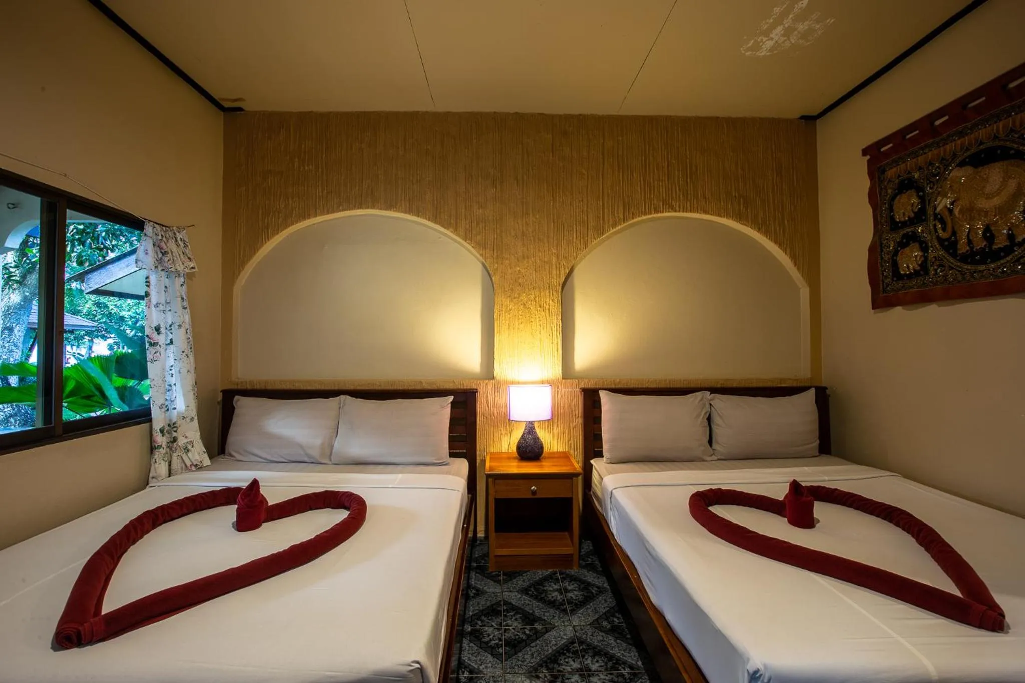 Bed in Nice Beach Resort Koh Pha-ngan