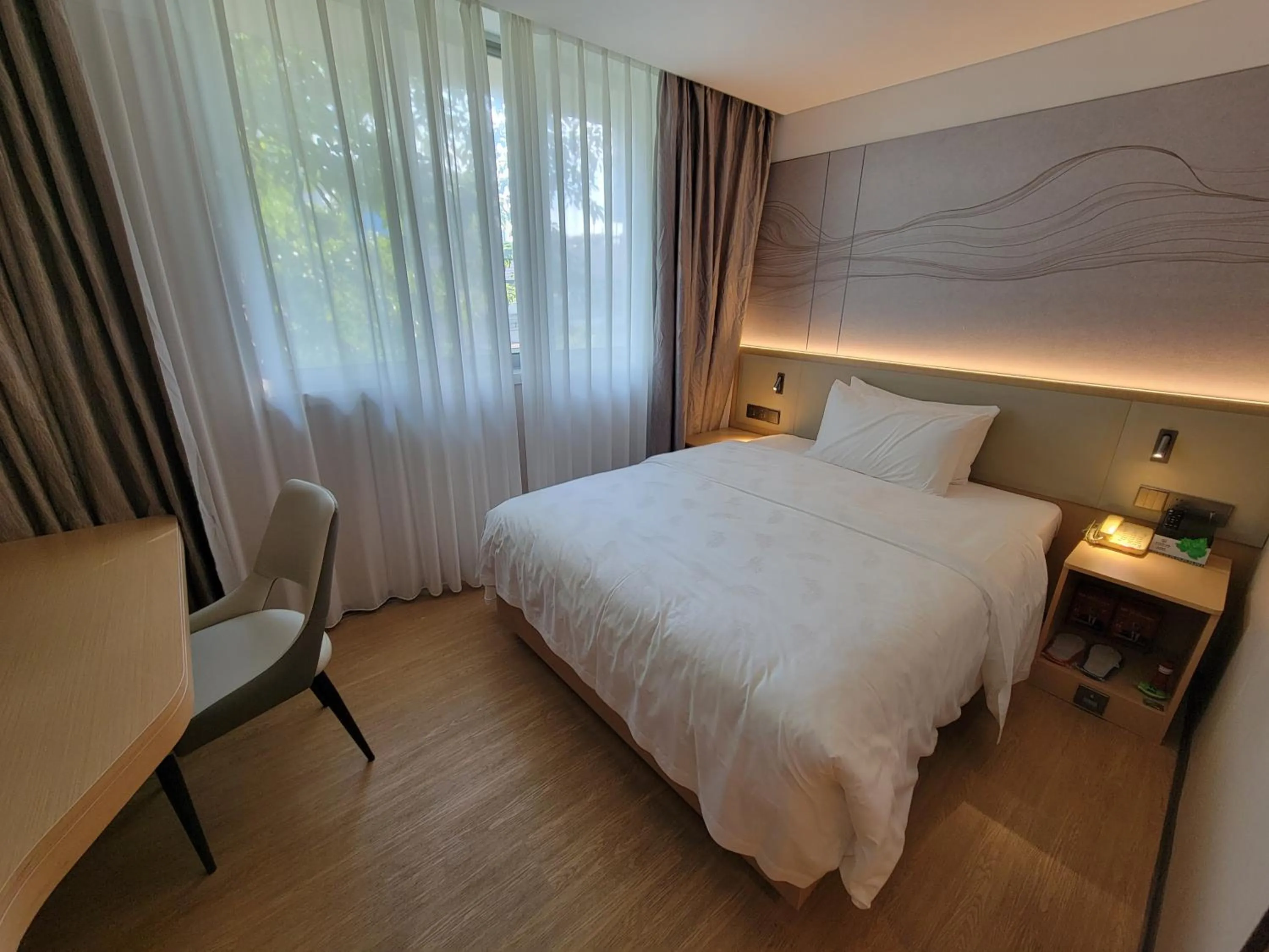 Bed in Guangdong Baiyun City Hotel