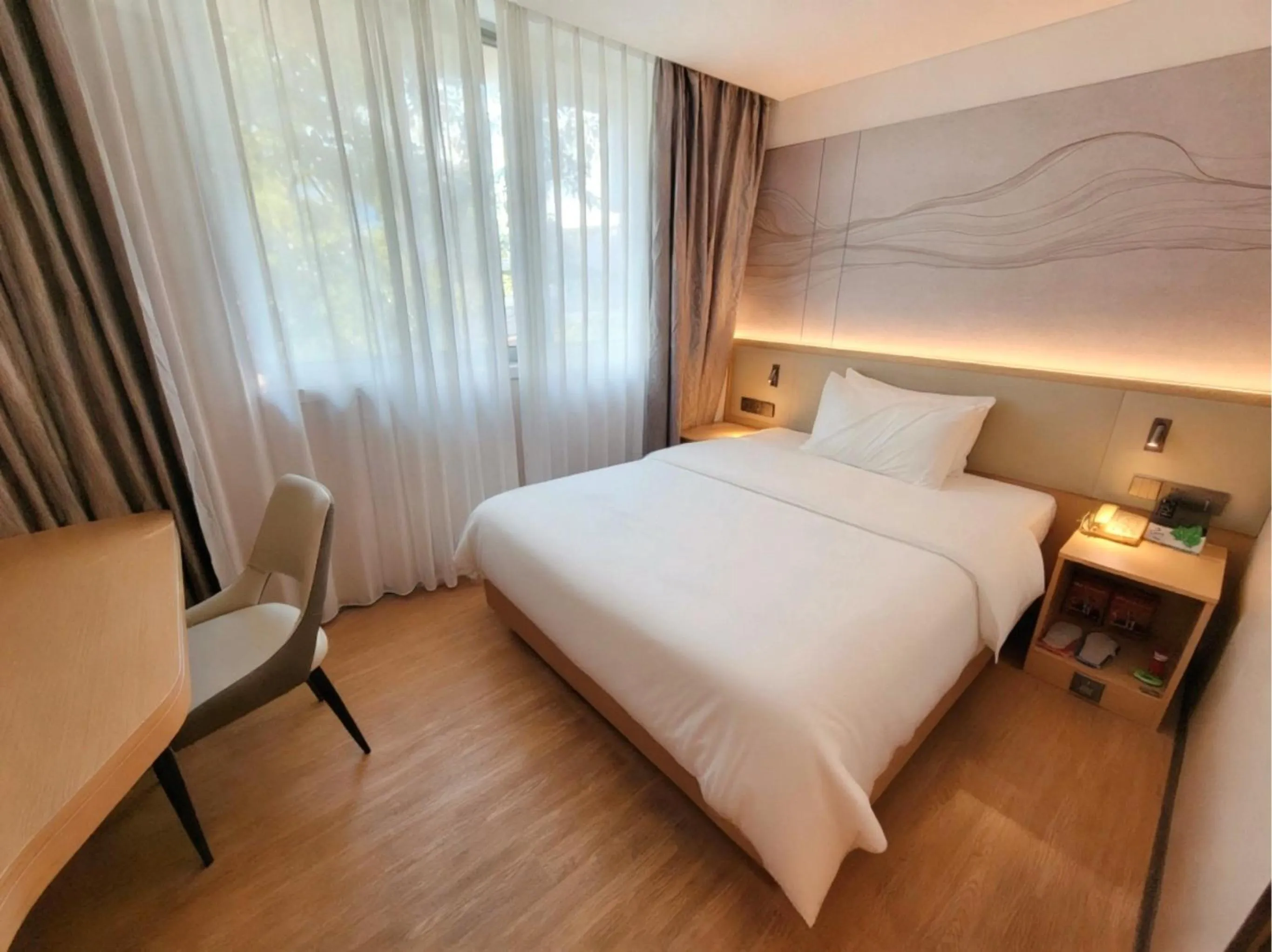 Bed in Guangdong Baiyun City Hotel