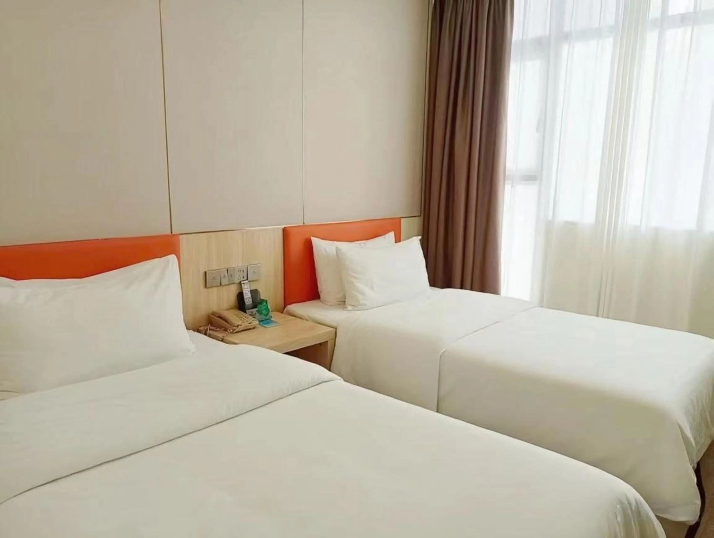 Bed in Guangdong Baiyun City Hotel