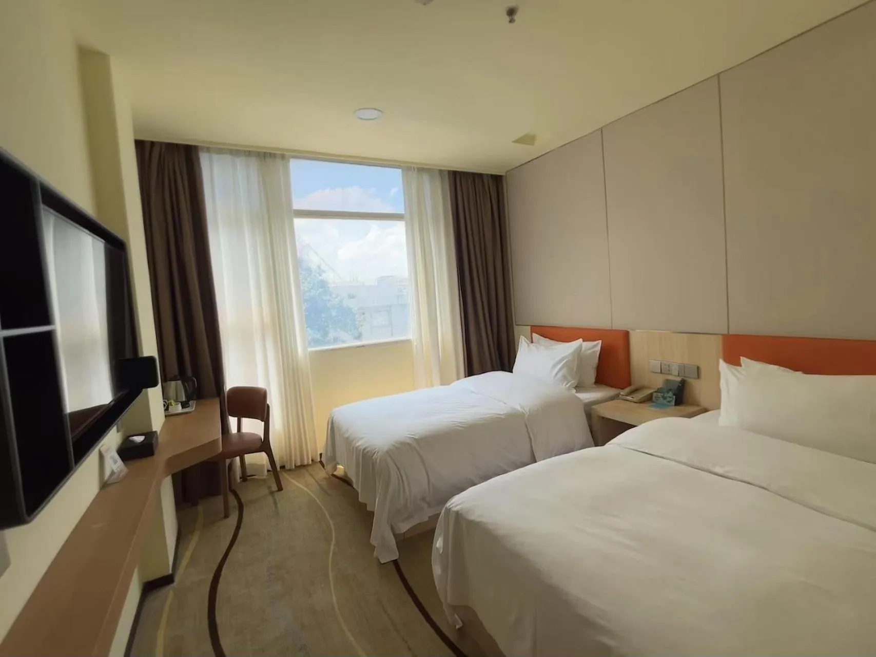 Bed in Guangdong Baiyun City Hotel