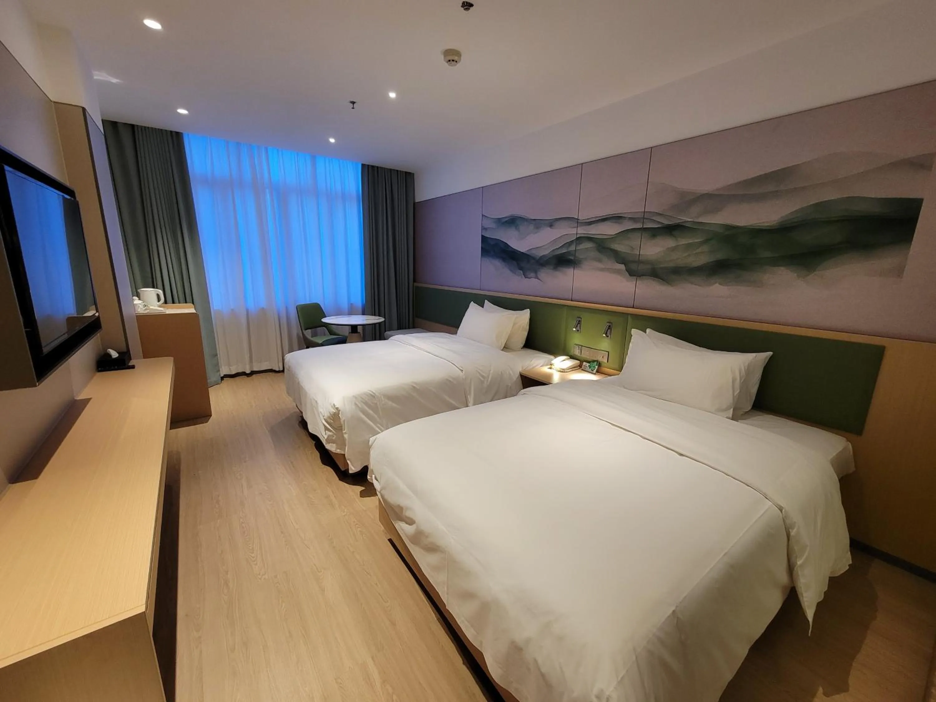 Bed in Guangdong Baiyun City Hotel