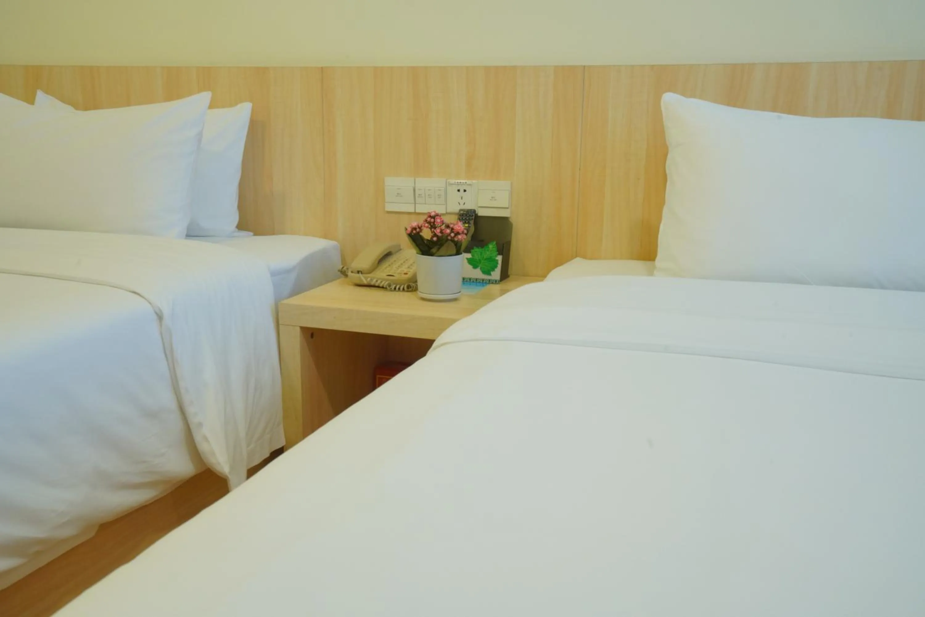 Bed in Guangdong Baiyun City Hotel