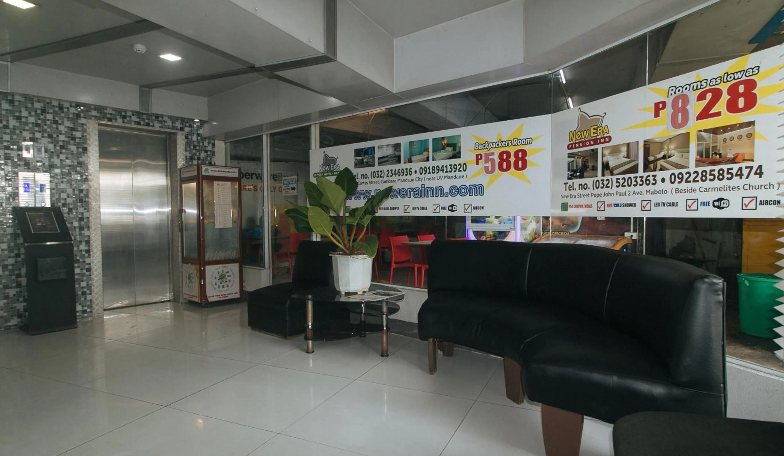 Seating area in RedDoorz Plus New Era Budget Hotel Mandaue former RedDoorz Plus near UV Mandaue Cebu