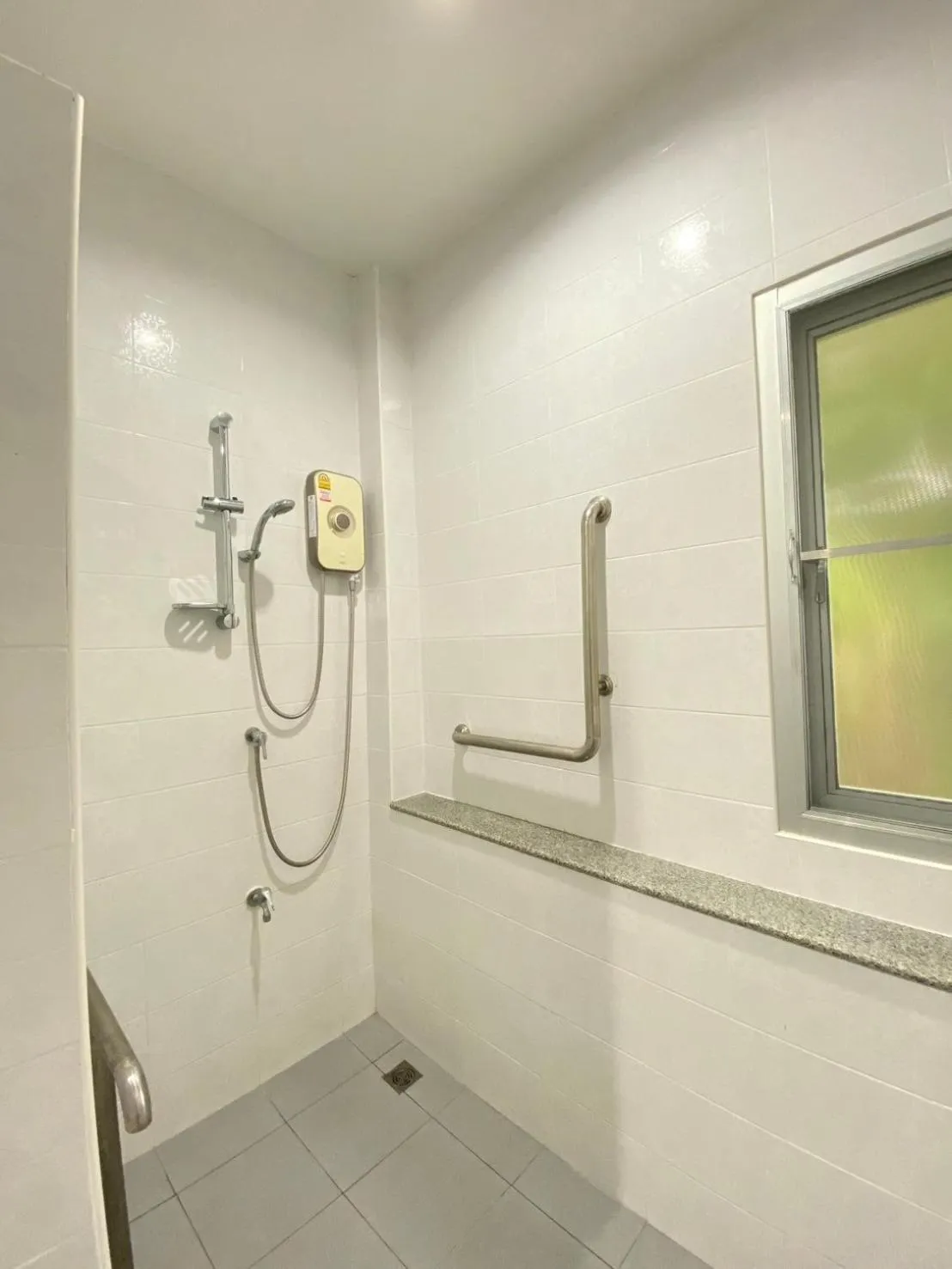 Shower in Baan Pingkan Wellness Resort