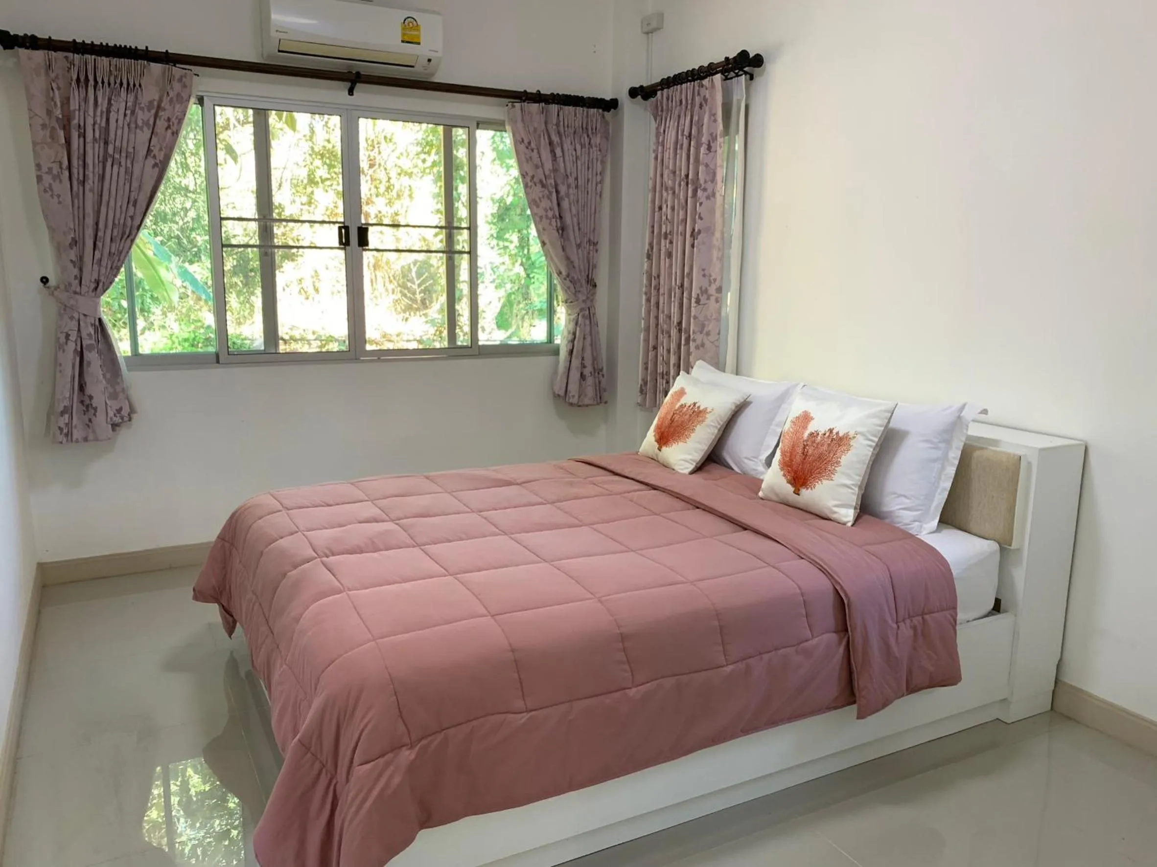 Bed in Baan Ping Kan Longstay