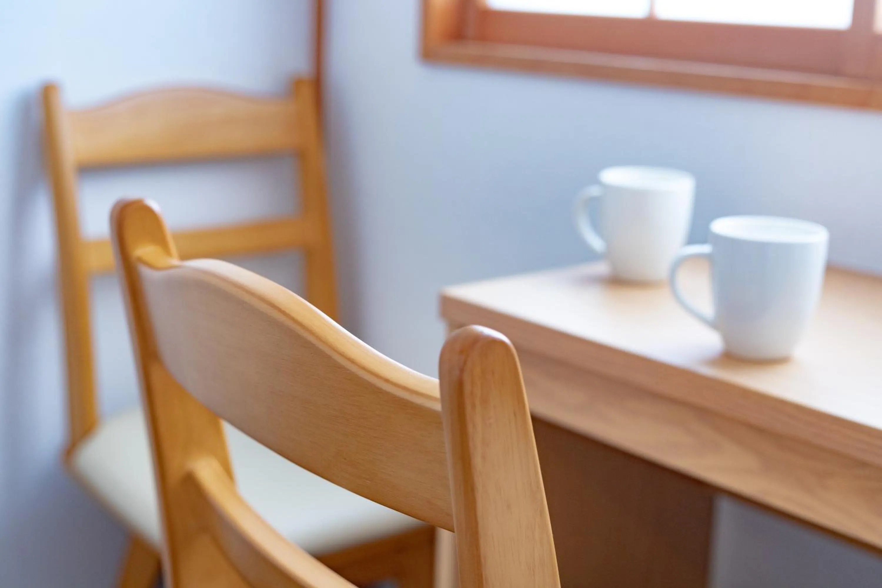 Seating area in CHALET BURLAP FURANUI