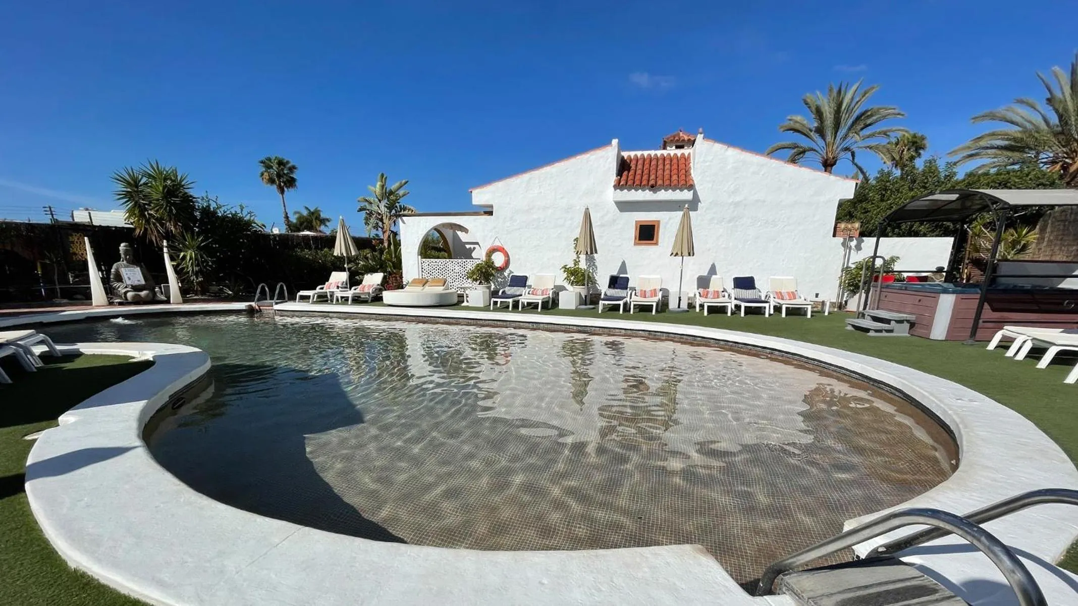 Pool view in Rainbow Golf Bungalows, Gay Men-only Resort