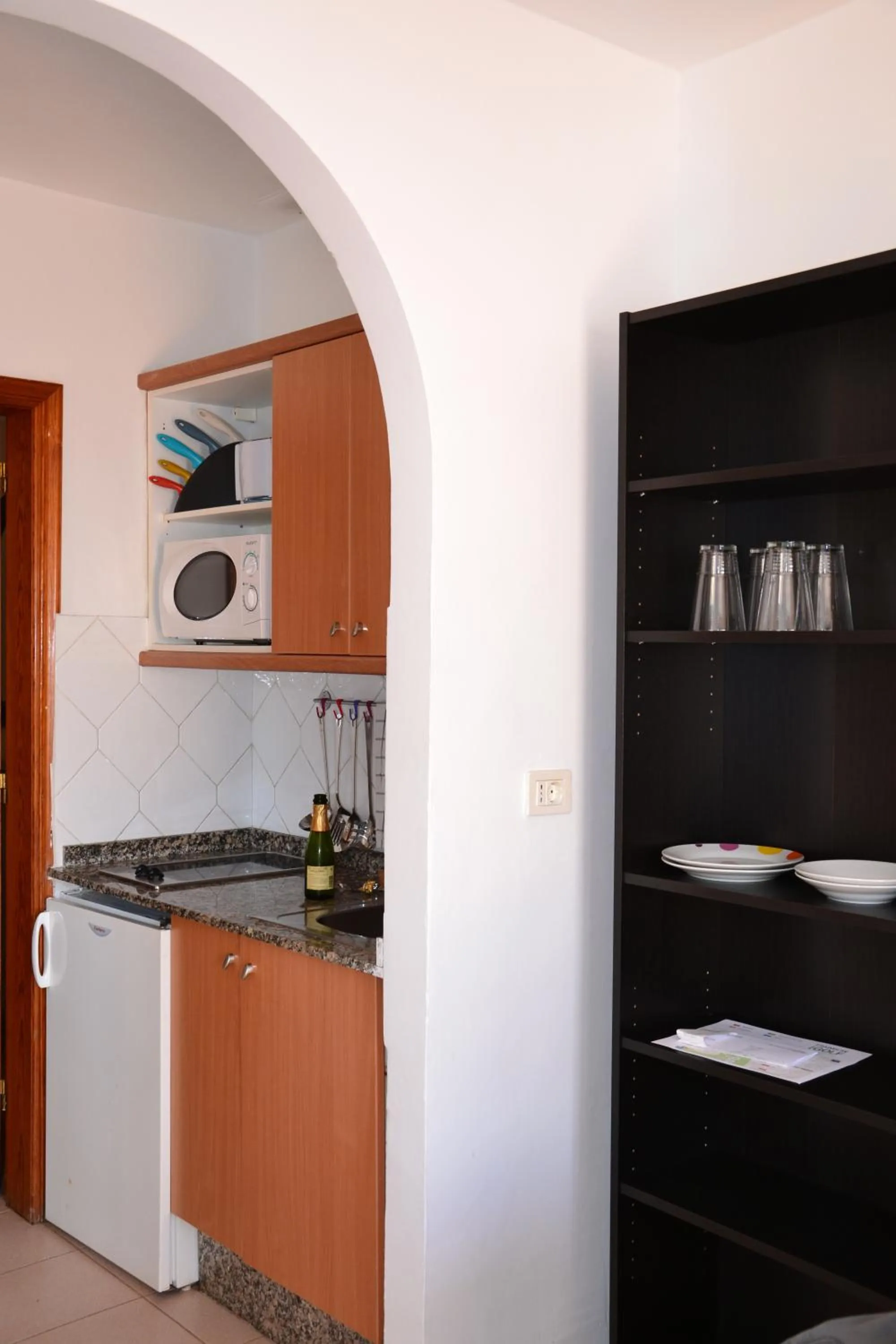 Kitchen or kitchenette in Rainbow Golf Bungalows, Gay Men-only Resort