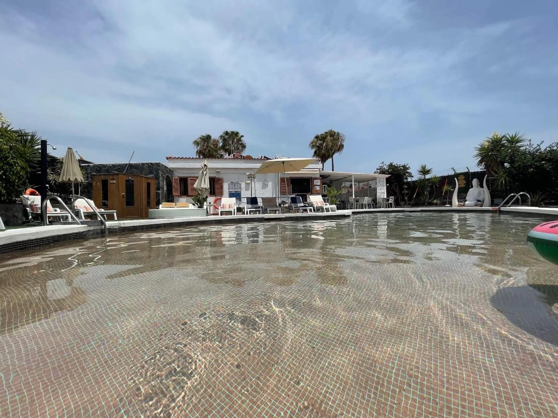 Pool view in Rainbow Golf Bungalows, Gay Men-only Resort