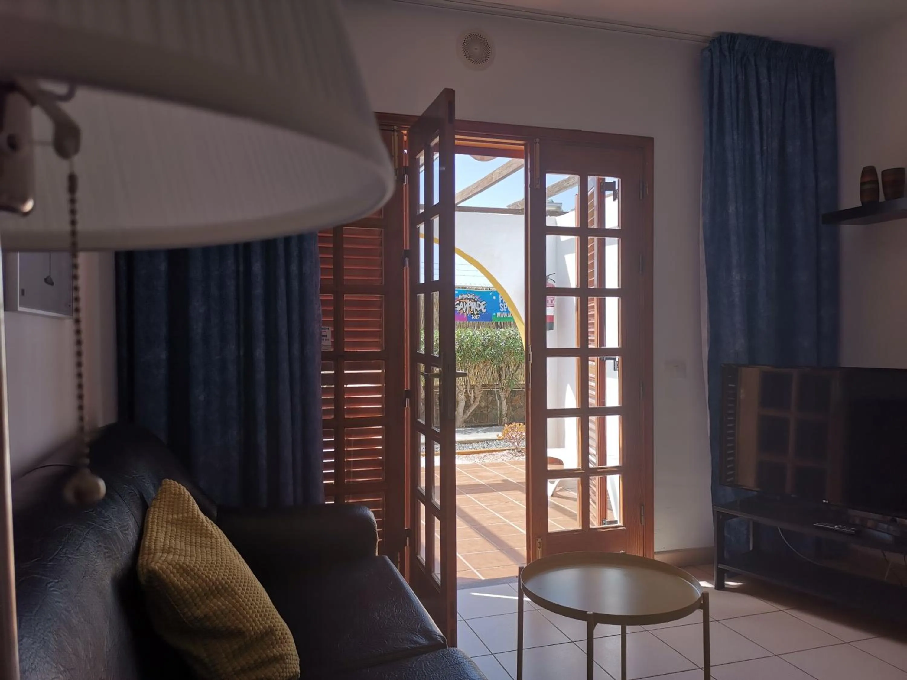 Living room in Rainbow Golf Bungalows, Gay Men-only Resort