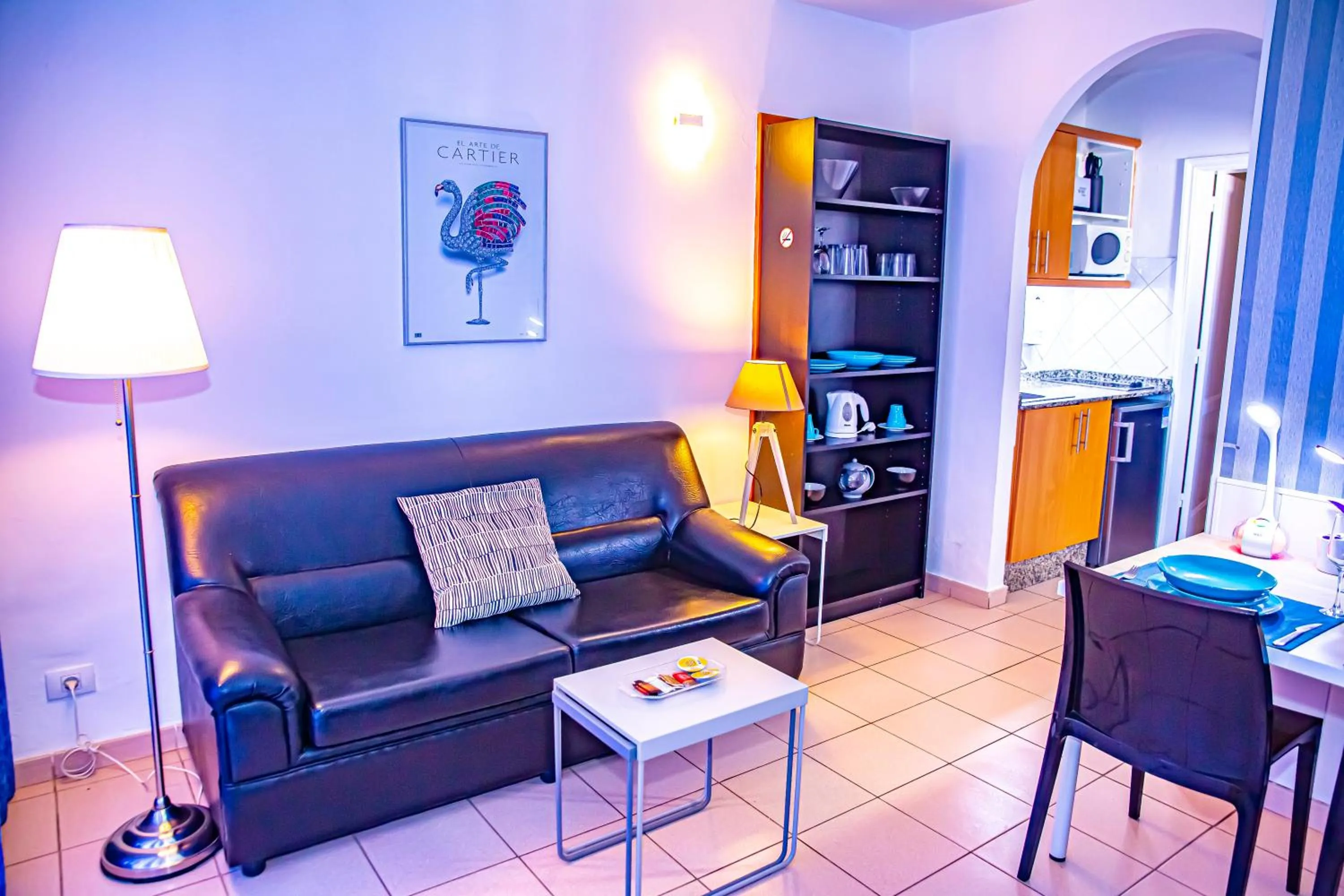 Living room in Rainbow Golf Bungalows, Gay Men-only Resort