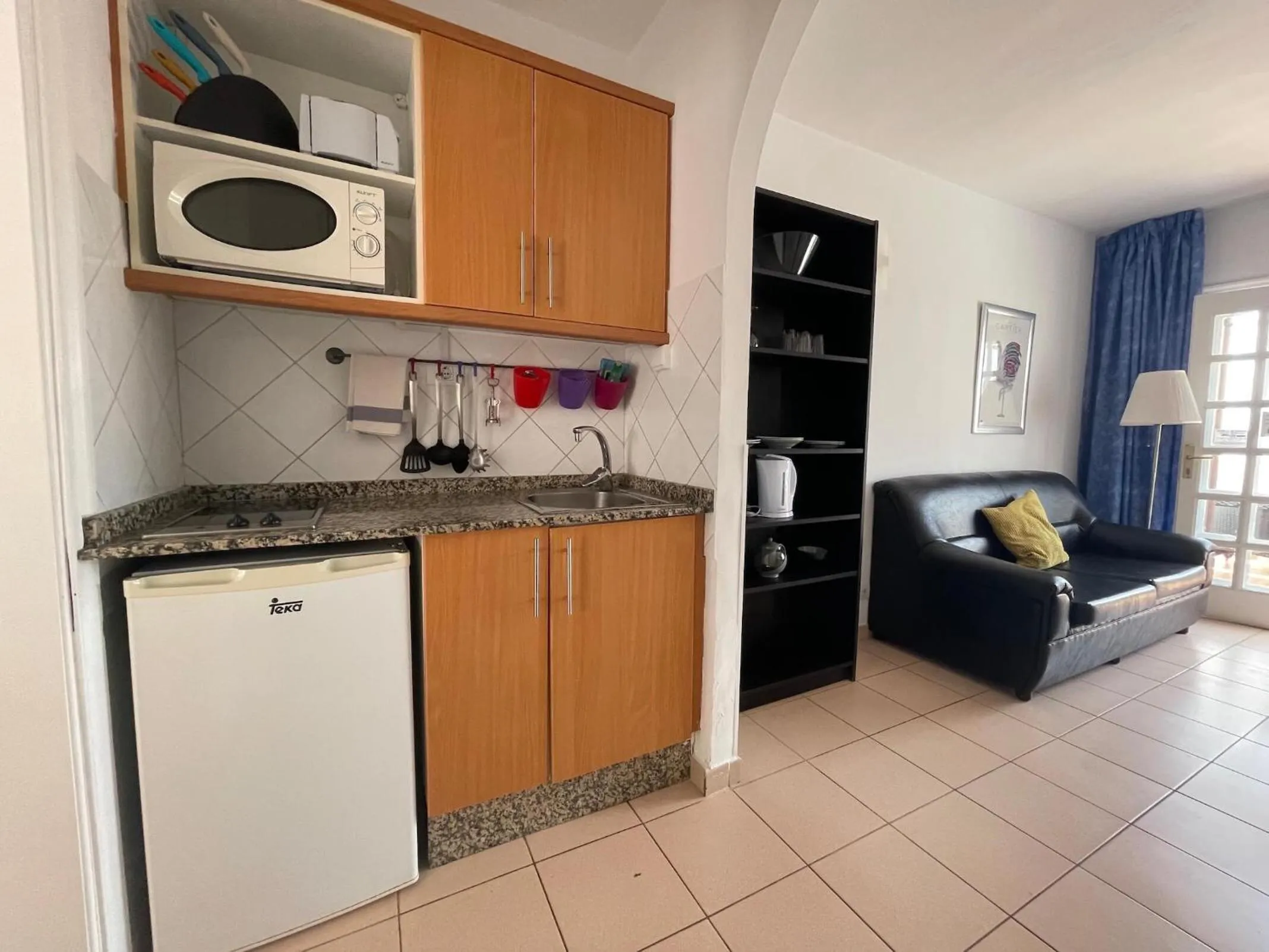 Kitchen or kitchenette in Rainbow Golf Bungalows, Gay Men-only Resort