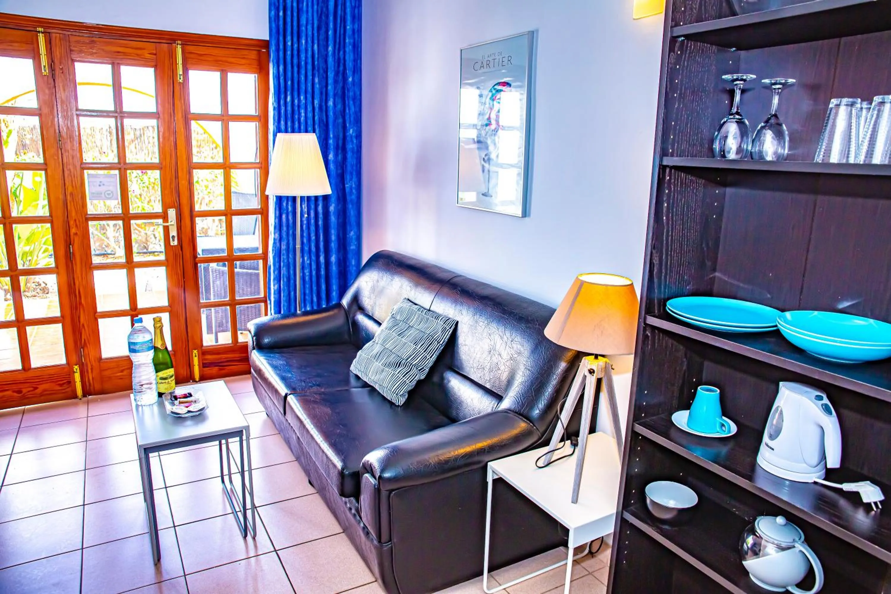 Living room in Rainbow Golf Bungalows, Gay Men-only Resort