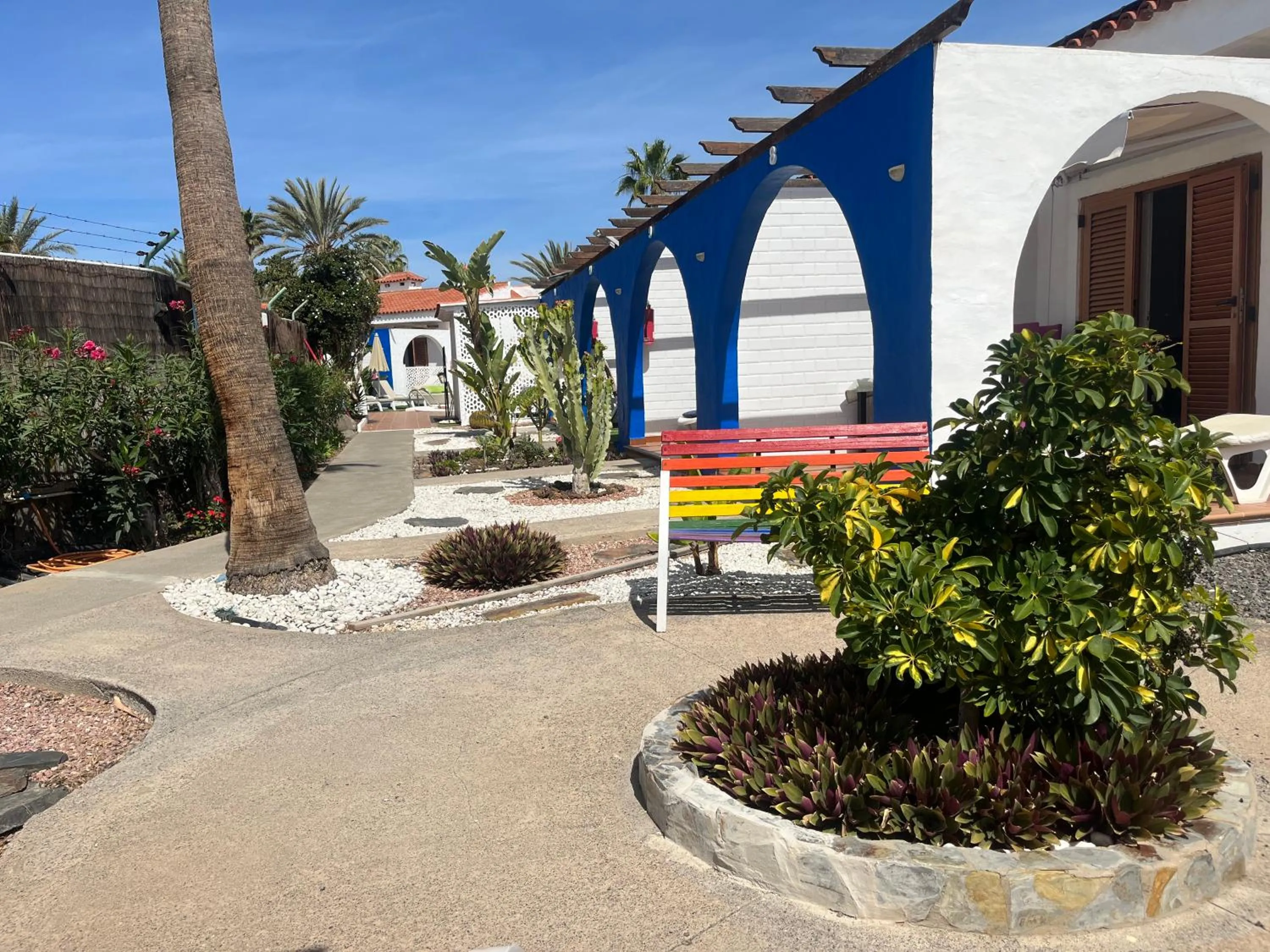 Property building in Rainbow Golf Bungalows, Gay Men-only Resort