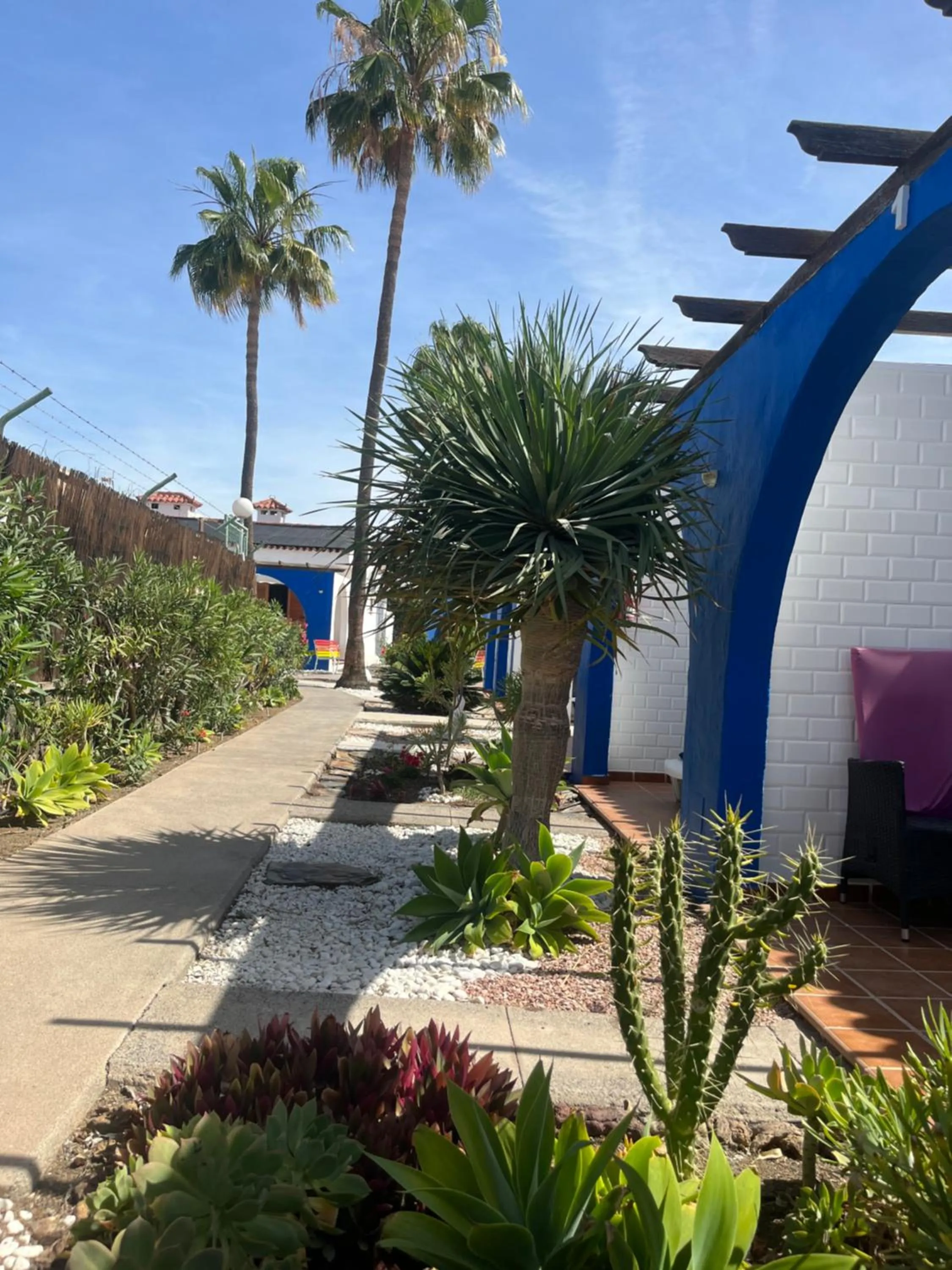 Property building in Rainbow Golf Bungalows, Gay Men-only Resort