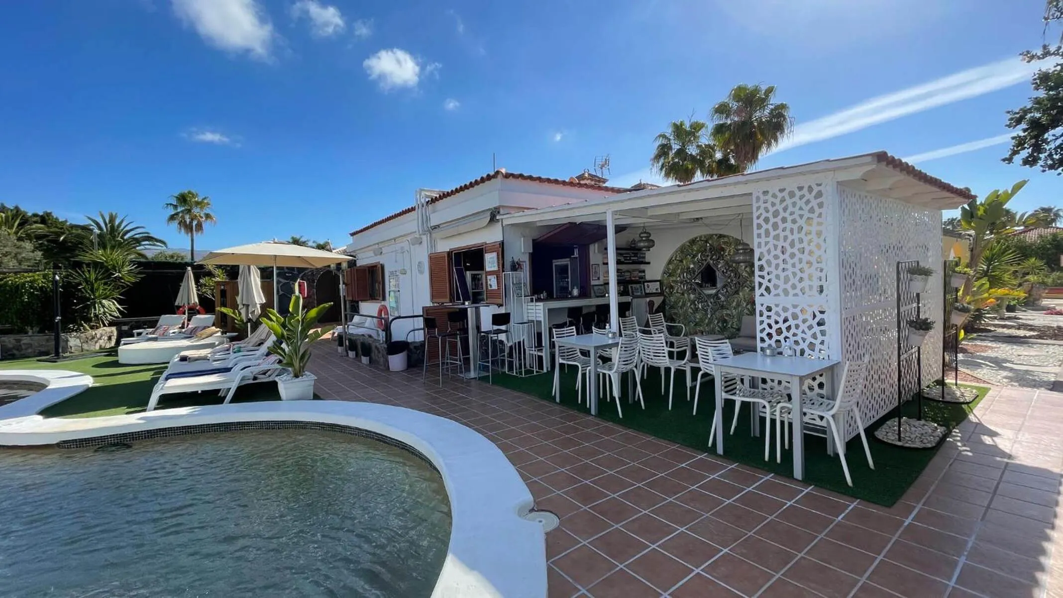 Lounge or bar in Rainbow Golf Bungalows, Gay Men-only Resort