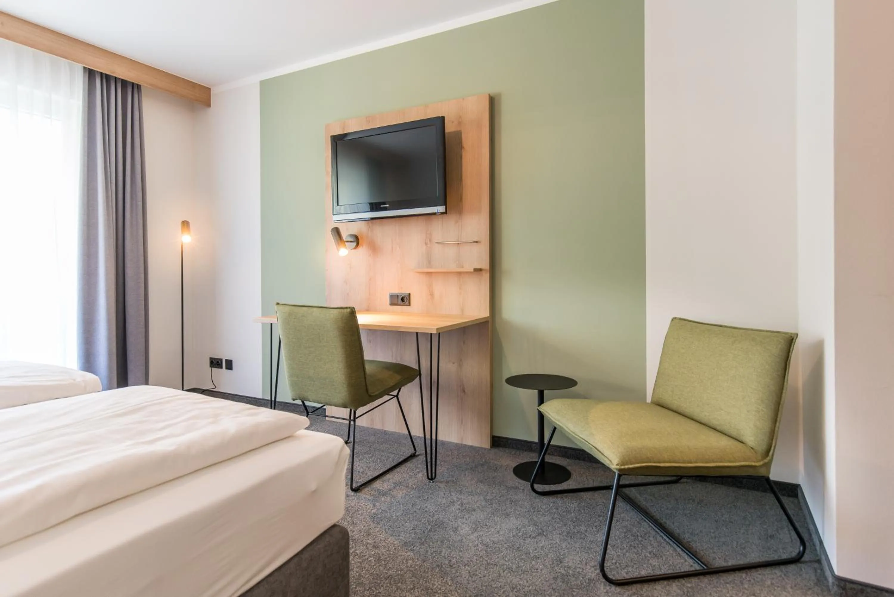 Seating area, Bed in Hotel Schwan