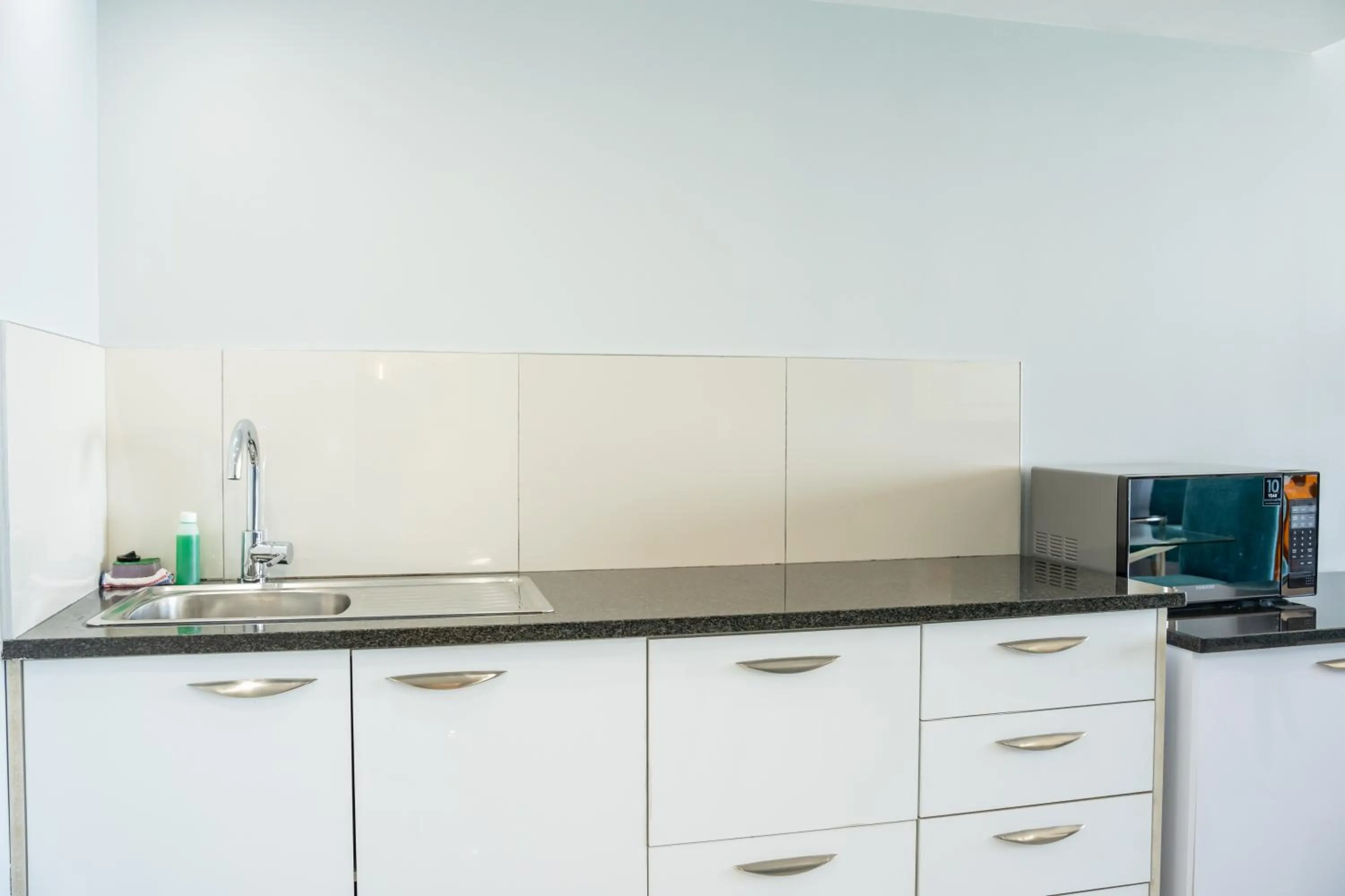 Kitchen or kitchenette in Blaauwberg Beach Hotel