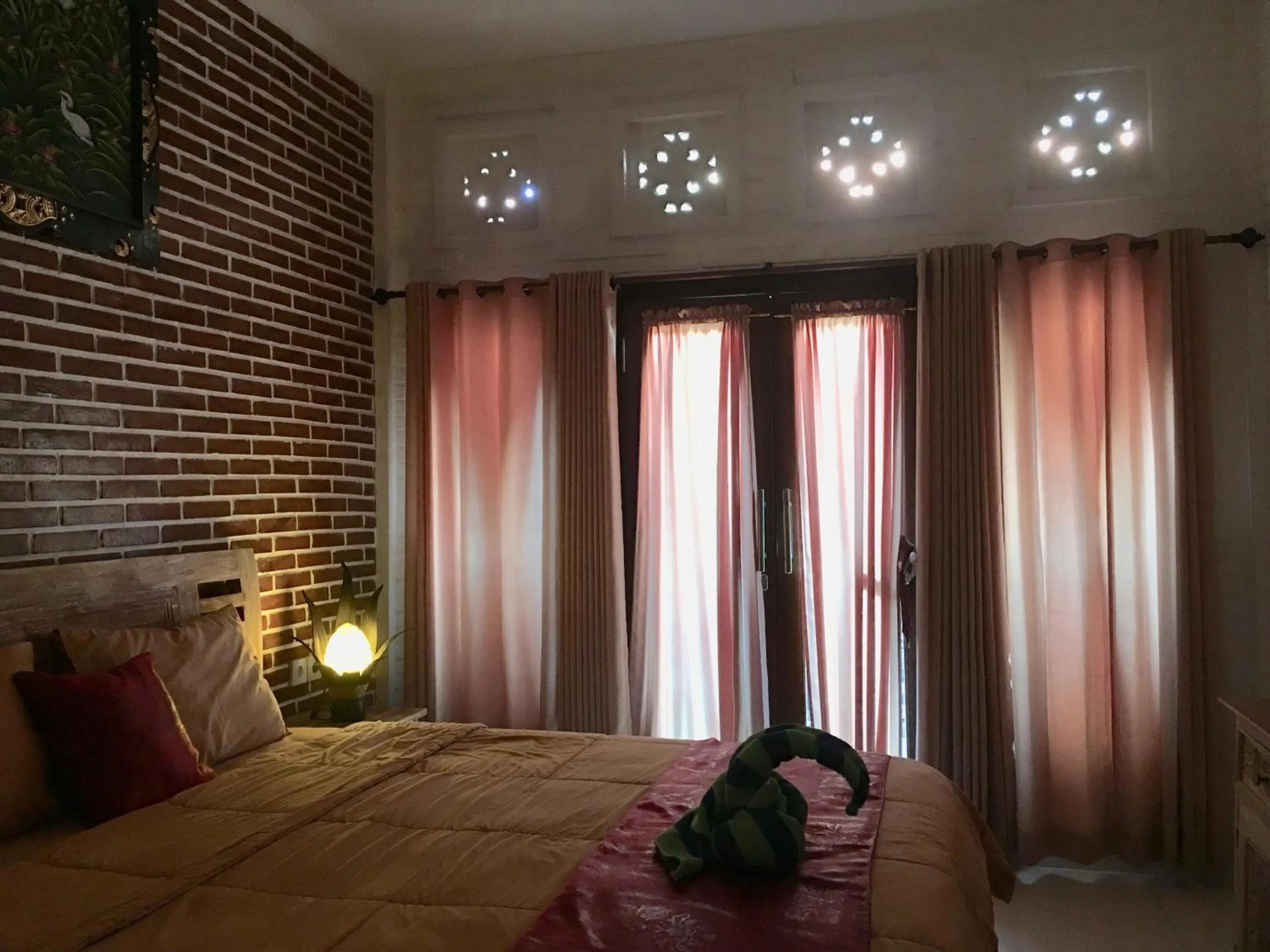 Bed in Mikuk Homestay Canggu