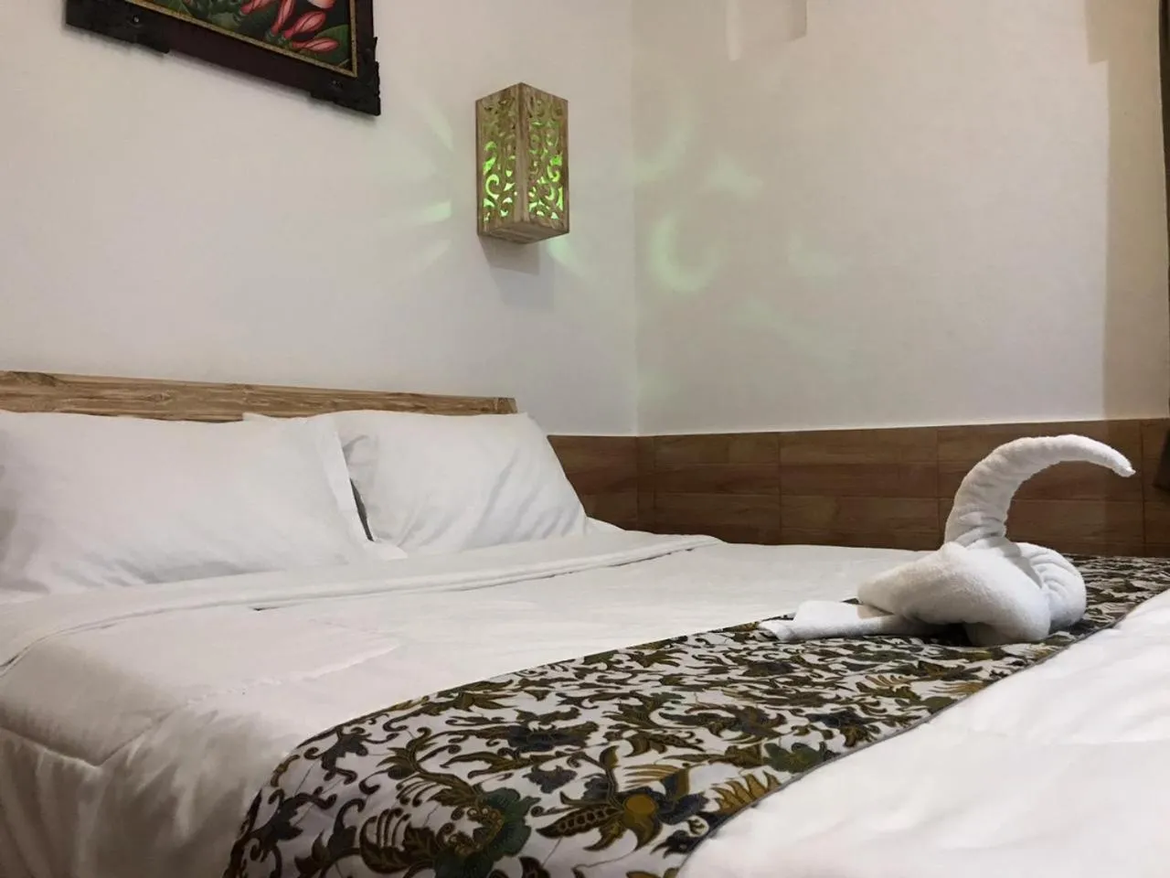 Bed in Mikuk Homestay Canggu