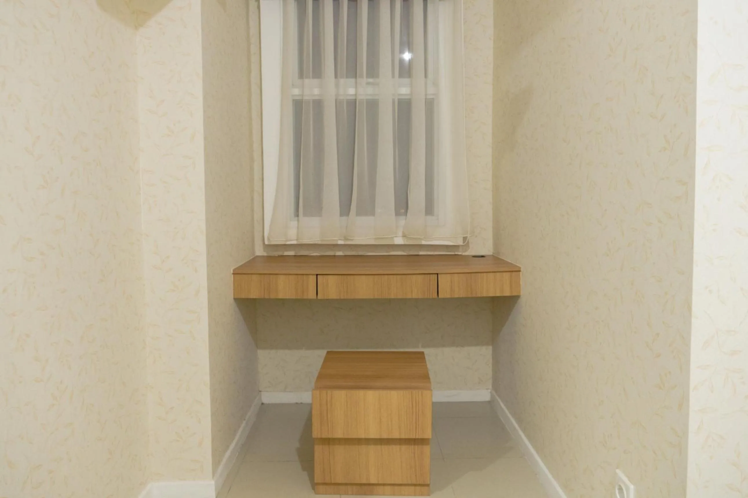 Minimalist 2BR Apartment at Parahyangan Residence By Travelio