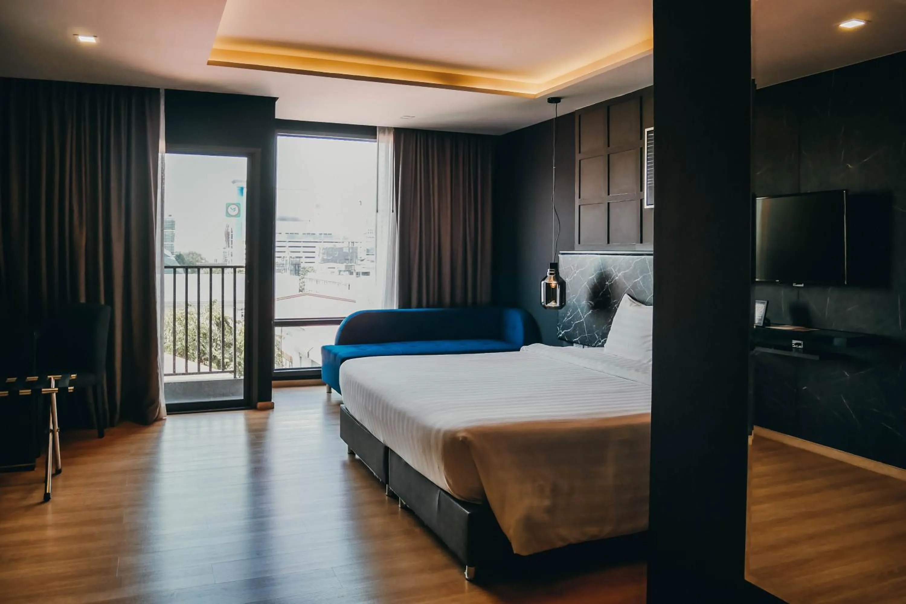 Bed in De Prime Rangnam Hotel