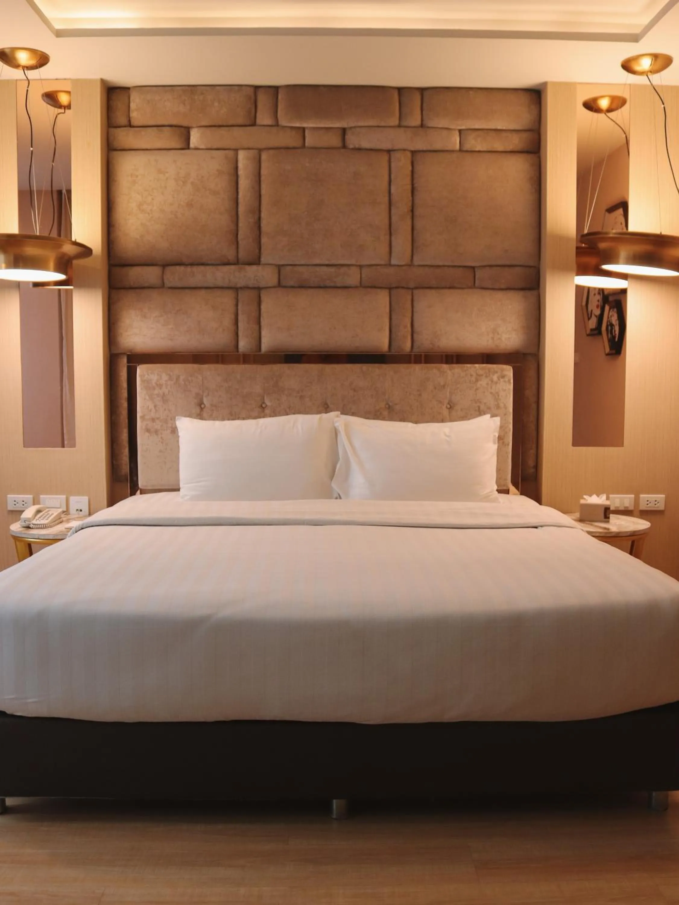 Bed in De Prime Rangnam Hotel