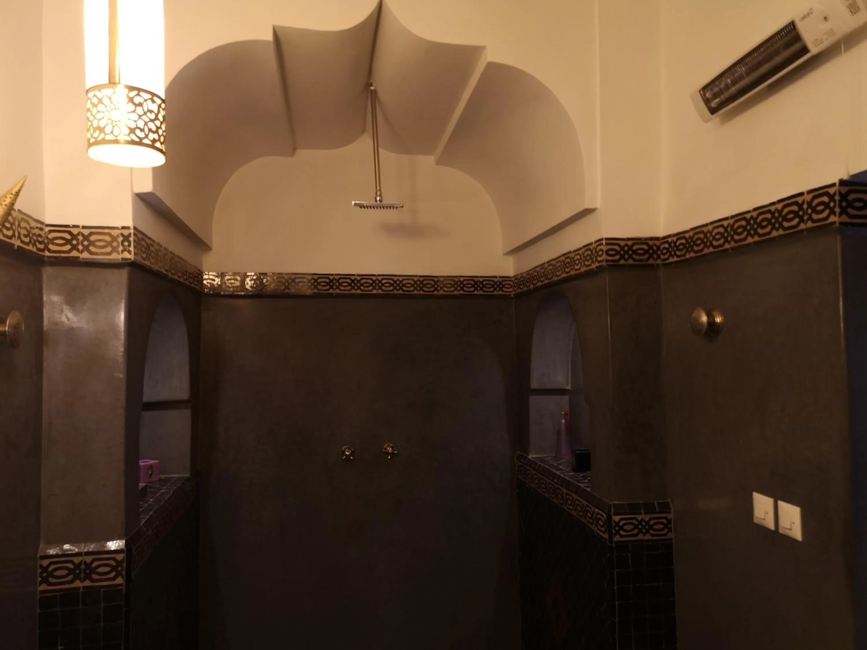 Shower in Riad Charme d'Orient Adults Only