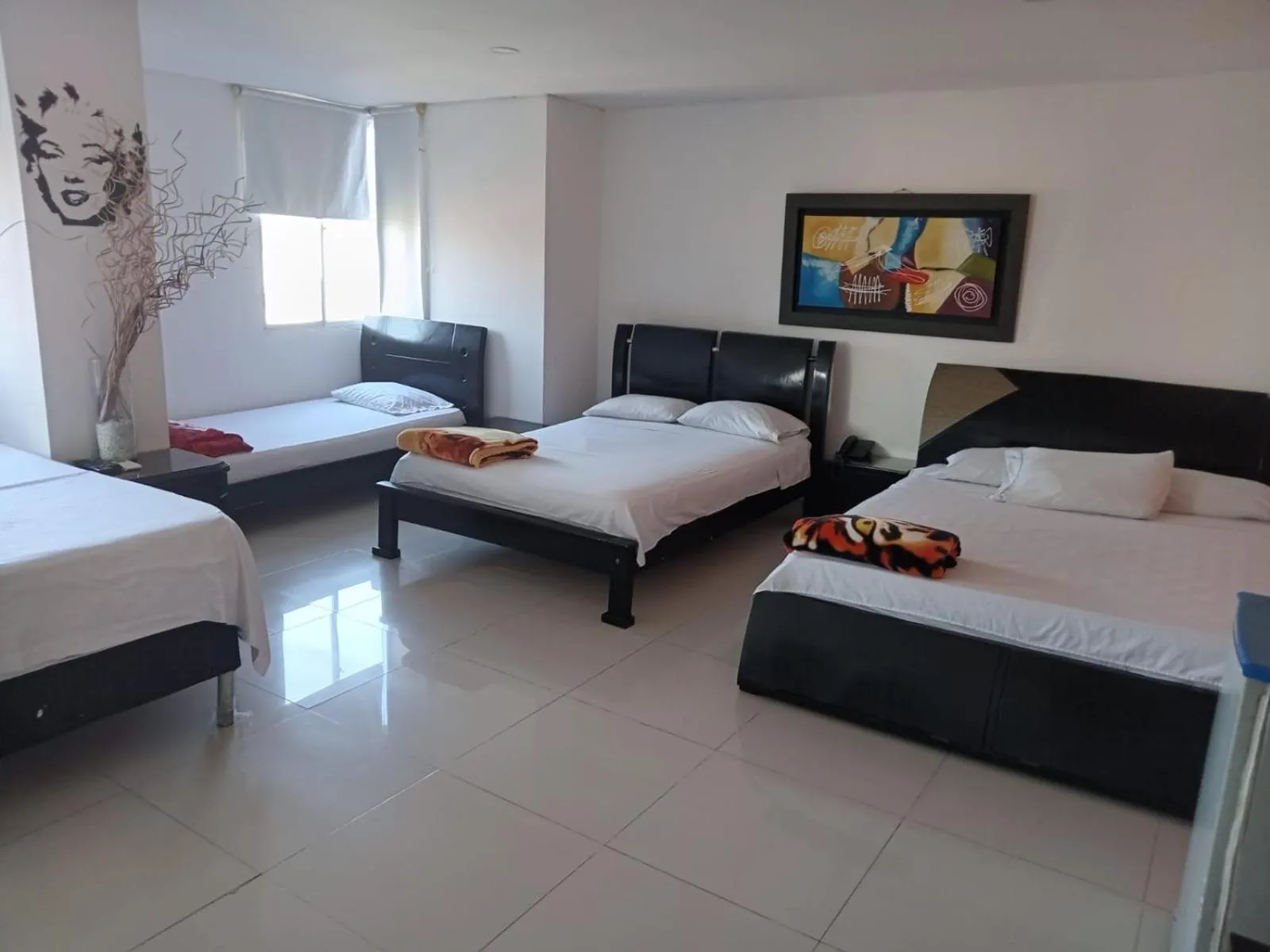 Bed in Hotel Intersuites