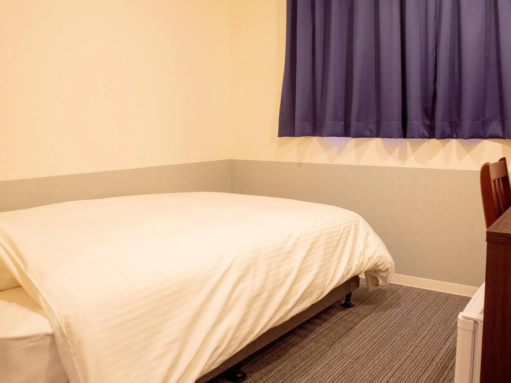 Bed in Hotel Taiyo Noen Nibancho