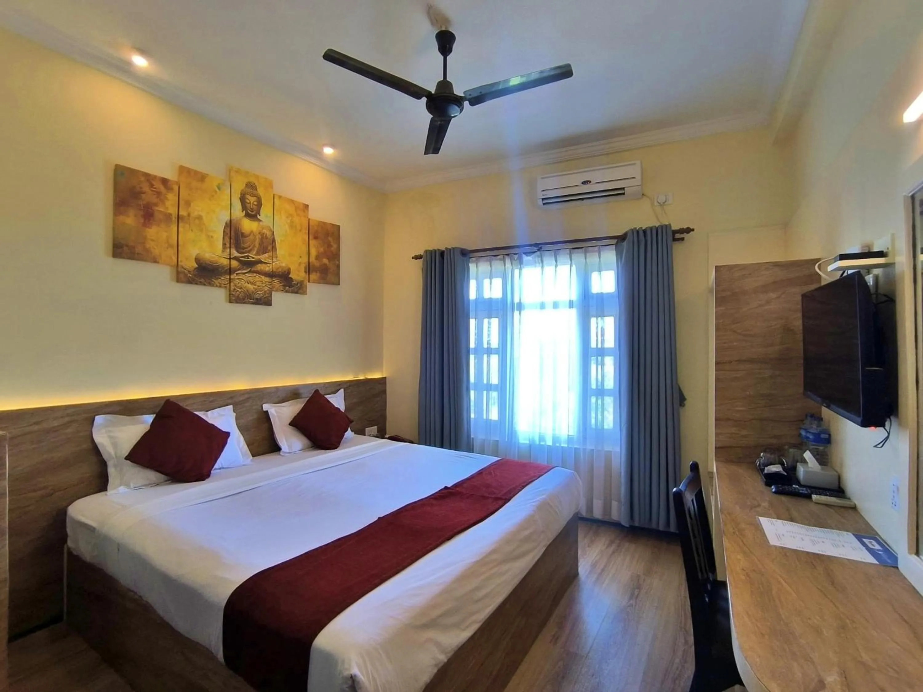 Bed in Hotel Peaceland Lumbini