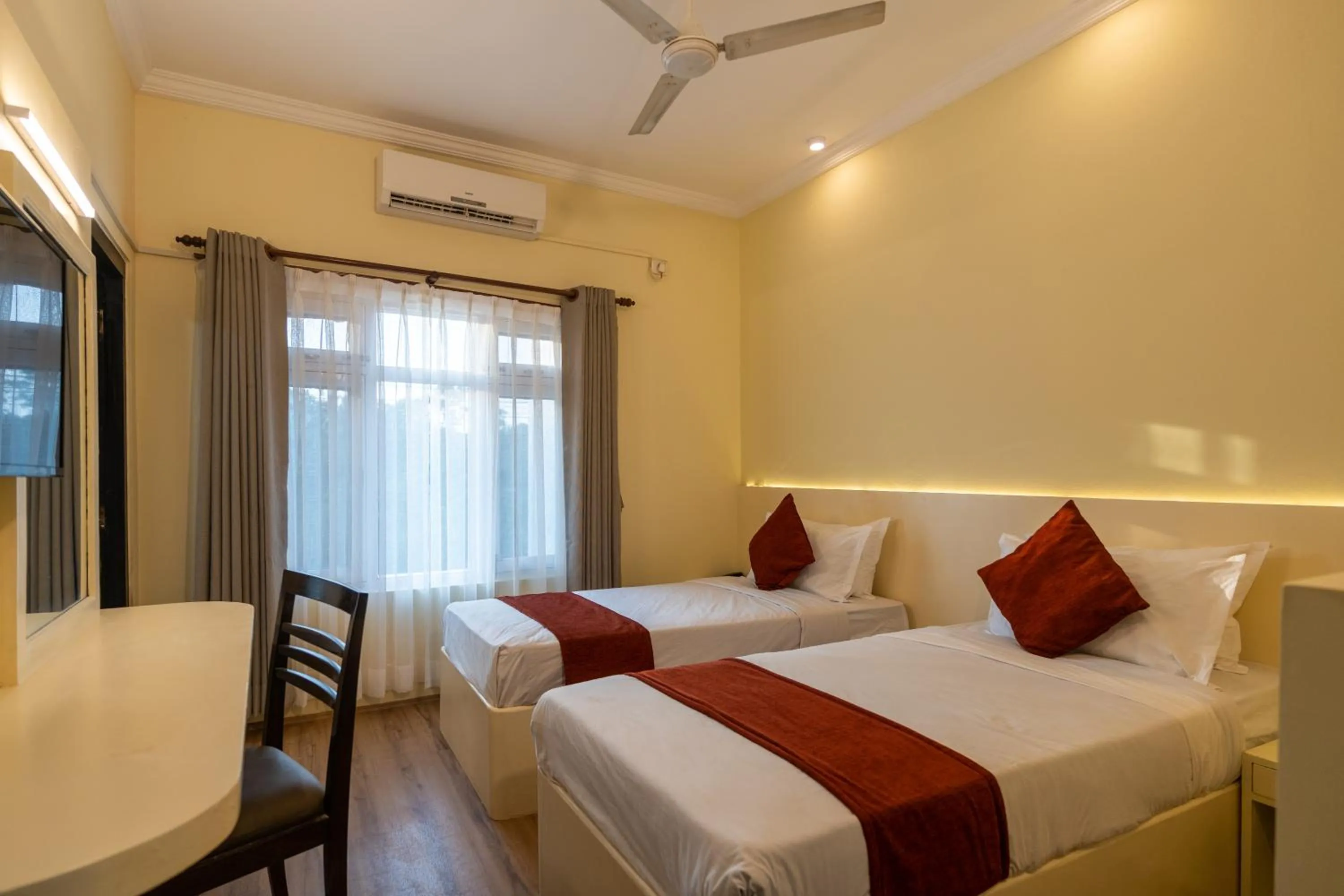 Bed in Hotel Peaceland Lumbini