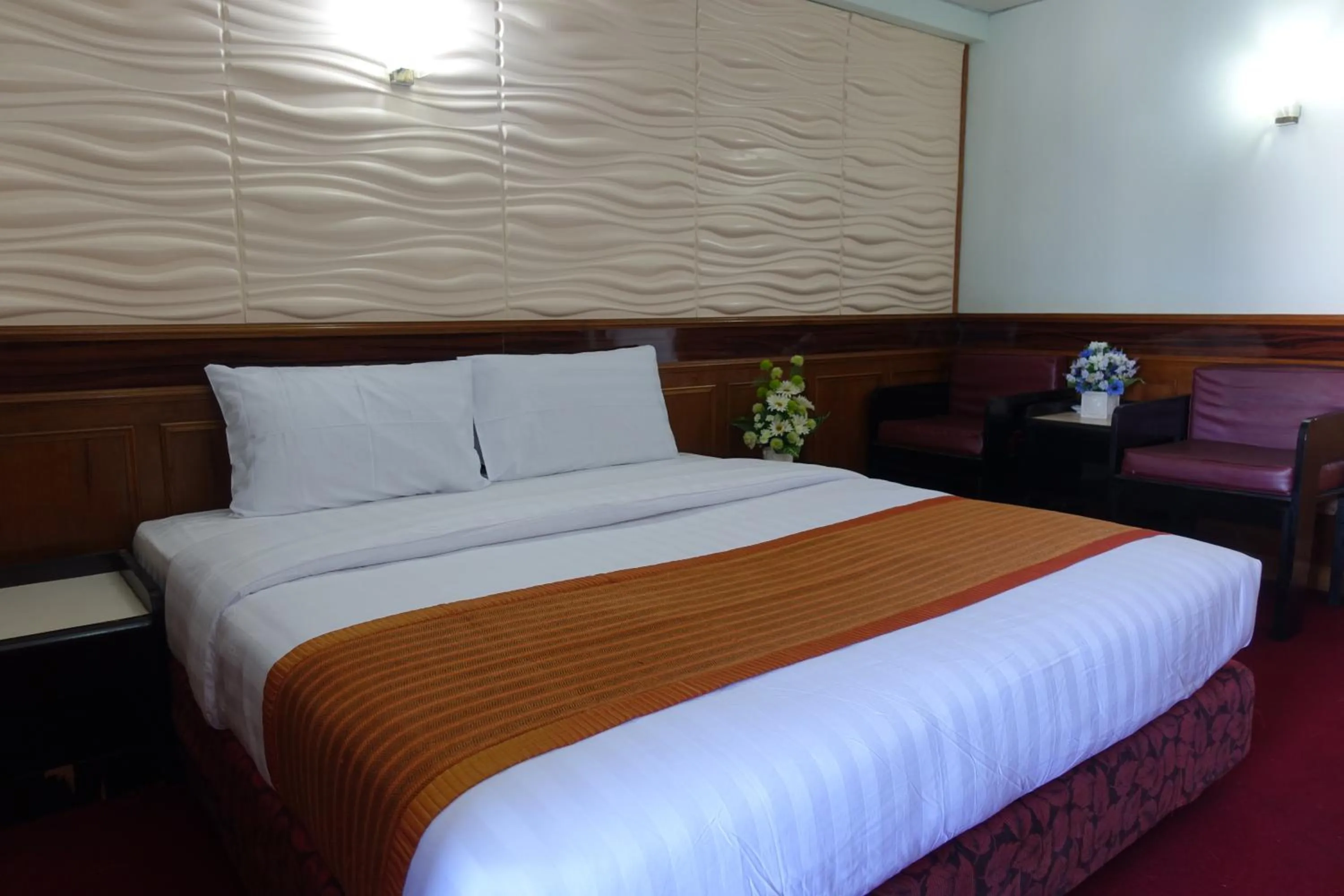 Bed in Serene Hotel