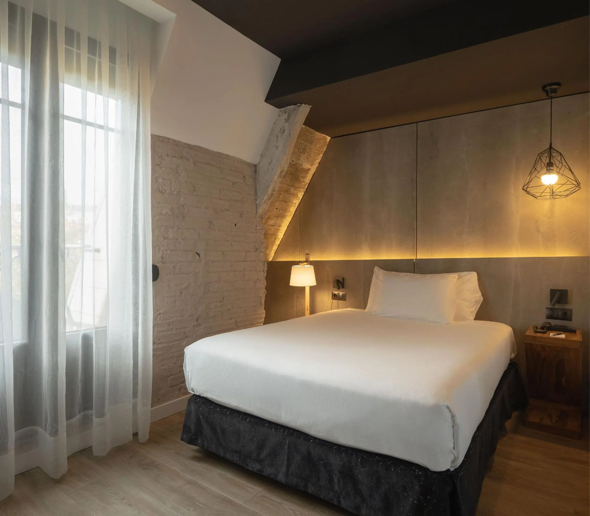 Bed in Hotel Tayko Bilbao