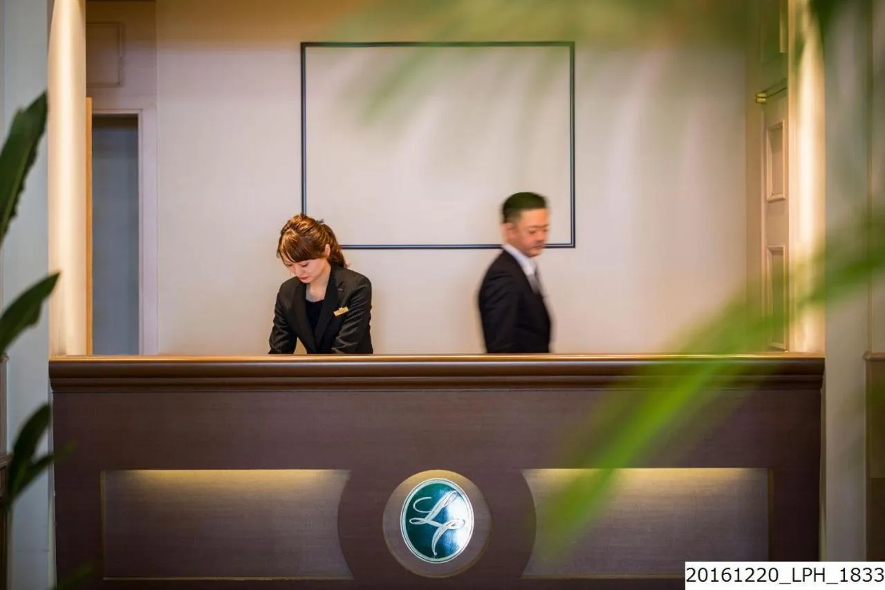 Staff in Luke Plaza Hotel