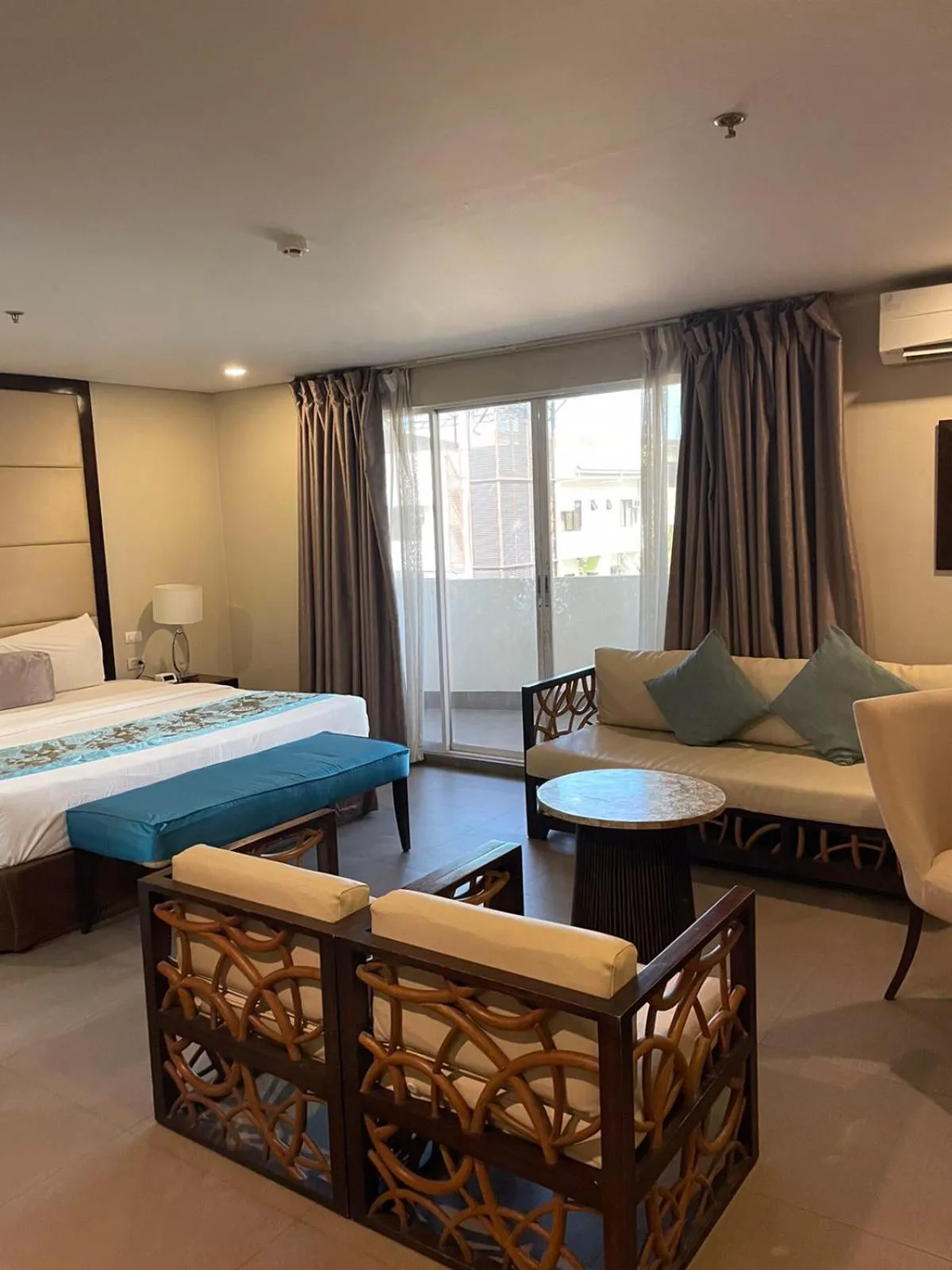 Bedroom, Bed in Goldberry Suites & Hotel Mactan