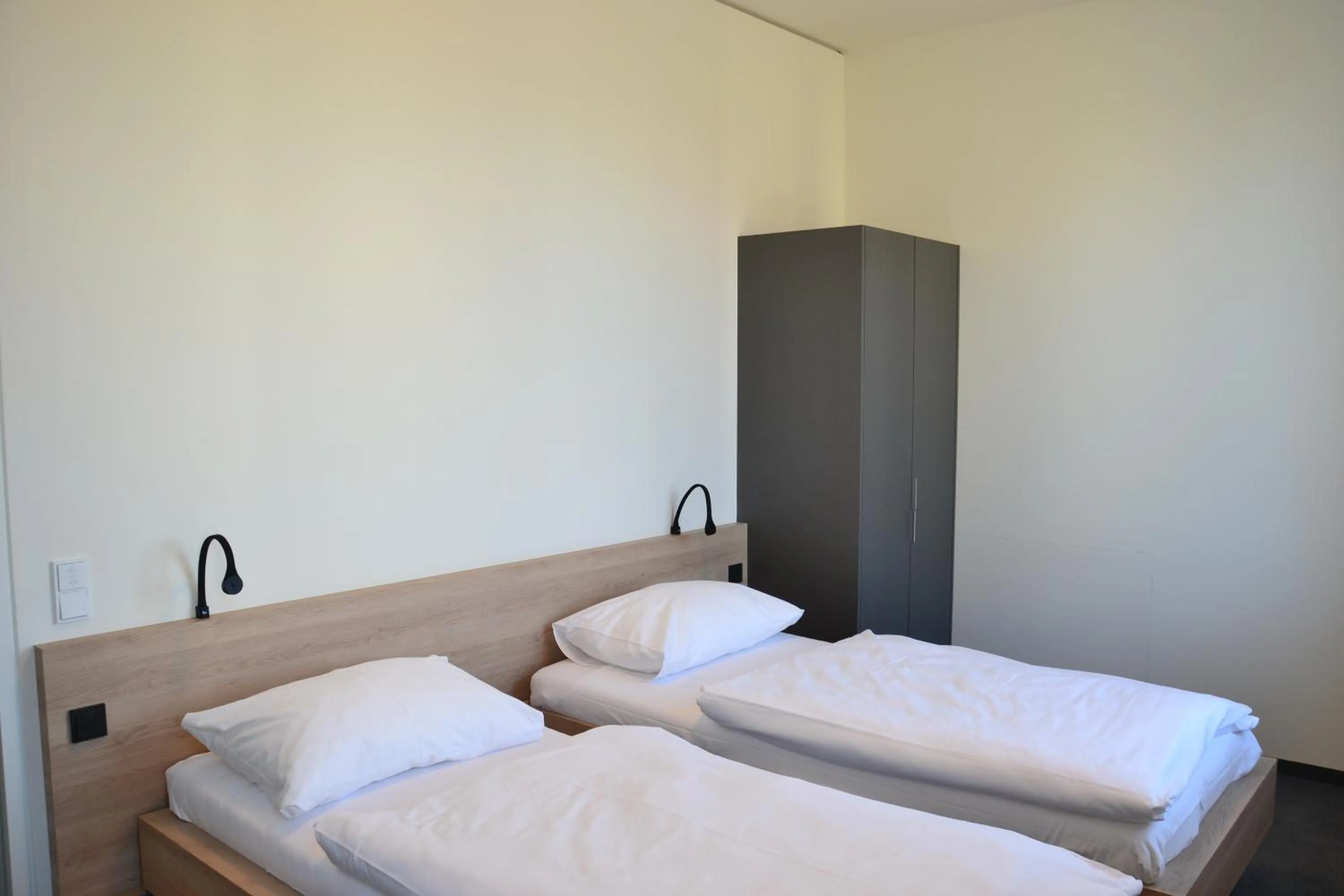 Bed in TT-ROOMS - kontaktlos mit Self Check-in I FREE PARKING